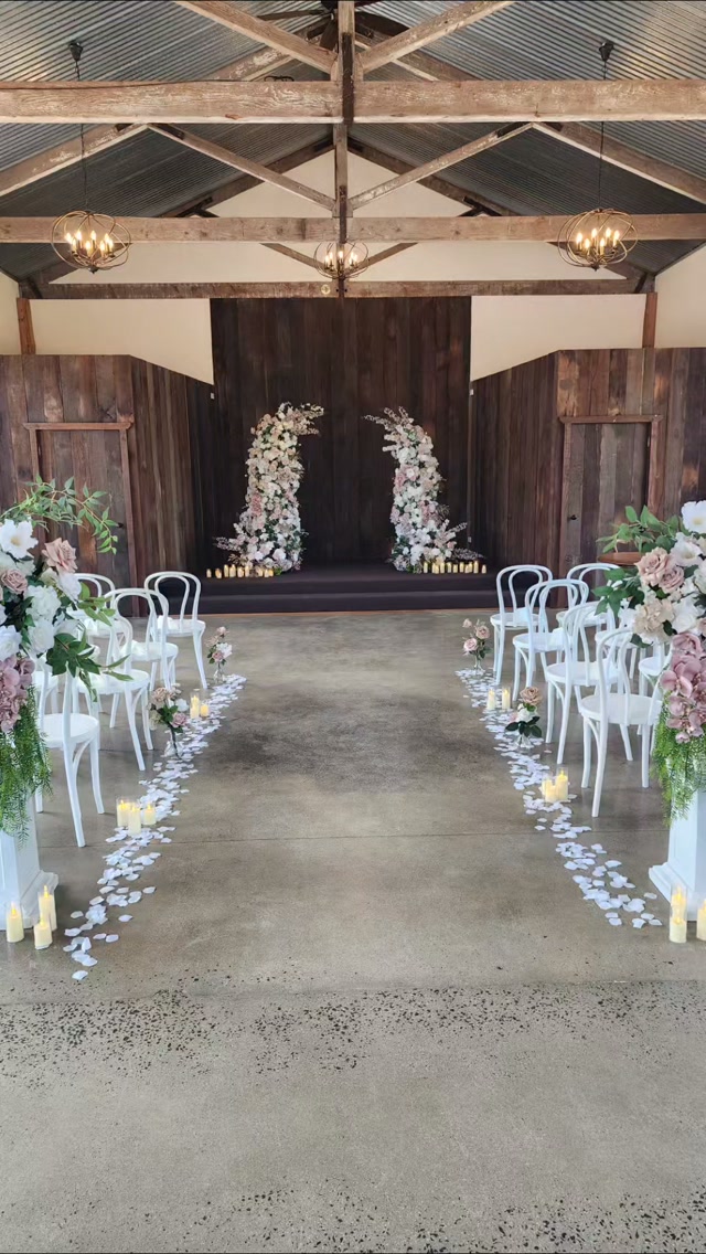 The most beautiful two ladies said yes today, surrounded by the softest nude tones and modern floral styling at the ever incredible The Shearing Shed on Phillip Island.
Jaymie and Bianca’s wedding ceremony was a beautiful blend of modern elegance and natural romance, with contemporary floral pillars and elegant pedestal florals bringing the entire setting together. Soft, neutral tones created a timeless palette that felt effortlessly refined, allowing every floral detail to complement the beauty of this incredible venue.
Creating wedding flowers and styling that bring a couple’s vision to life is always special, but celebrating the love between these two beautiful women made today even more meaningful.
Jaymie and Bianca, thank you for letting Decodays be part of your wedding day. Wishing you both a lifetime of love, laughter and beautiful moments together.
@jaymie_irlam @biancsvicino @theshearingshed @emilyhowlettphotography @fourbyfourfilms @eternalweddings @craigbraybrookcouture @sugartheorypi @catherine_nov_hair_studio @nicolebrownmua @lisamangionhmuartist @spinningdiscentertainment @decodays
#PhillipIslandWedding #TheShearingShed #MelbourneWeddingFlorist #WeddingCeremonyStyling #FauxWeddingFlowers