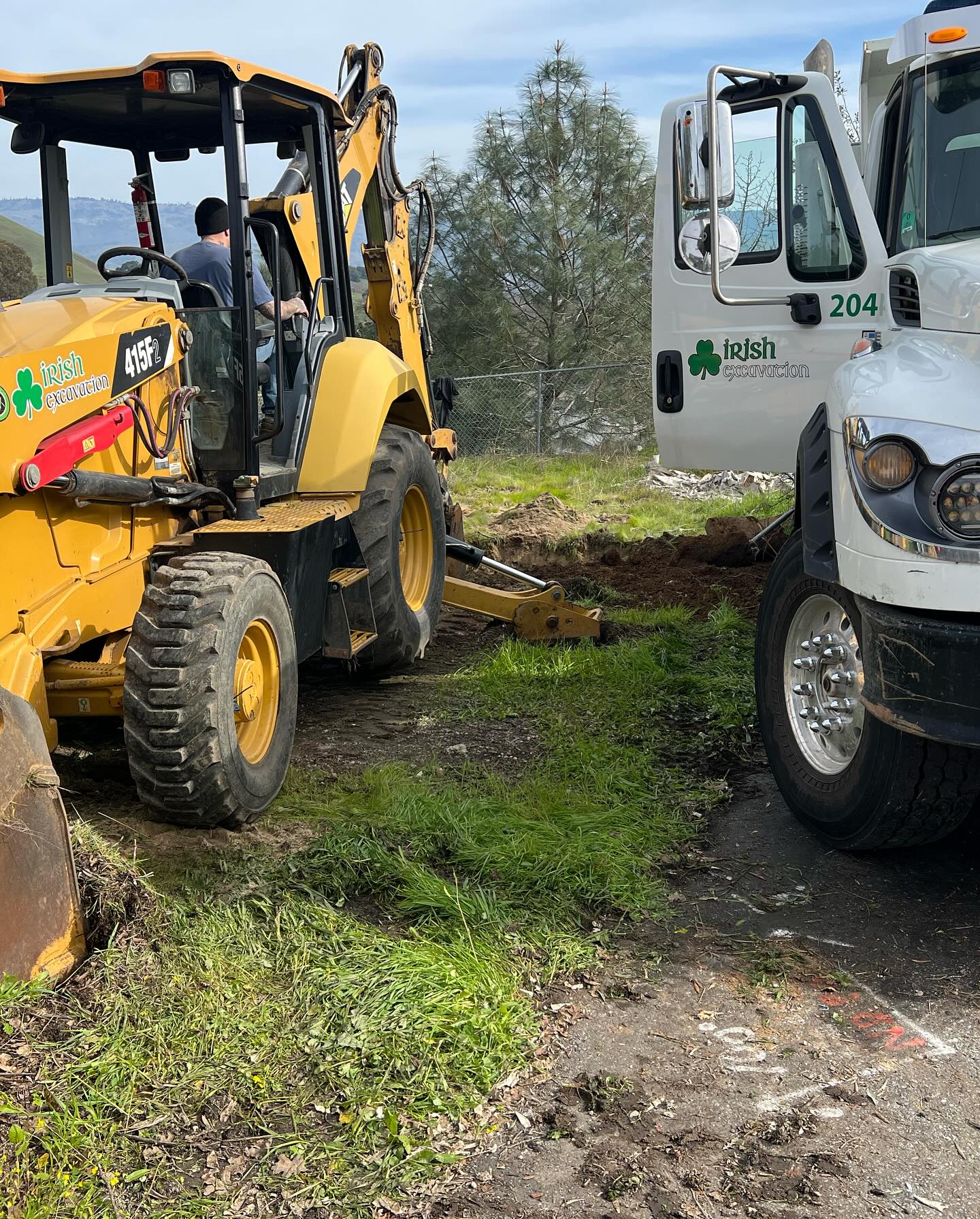 Another drip system going in the ground. Septic tank, recirculation tank, and pump tank…there is an intentional curve so that the tanks meet the setback from the driveway, this site is tight! We feel blessed to be as busy as we are right now, thankful for the work! A big thank you for @donchapincompany for sending two trucks and squeezing into this site! @irishexcavation #irishexcavation #septic #septicsystem #alternativesystem #dripsystem #canyoudigit #weliketodigit #caterpillar #backhoesrule #cat415f2 #international #dumptruck #dumptrucklife