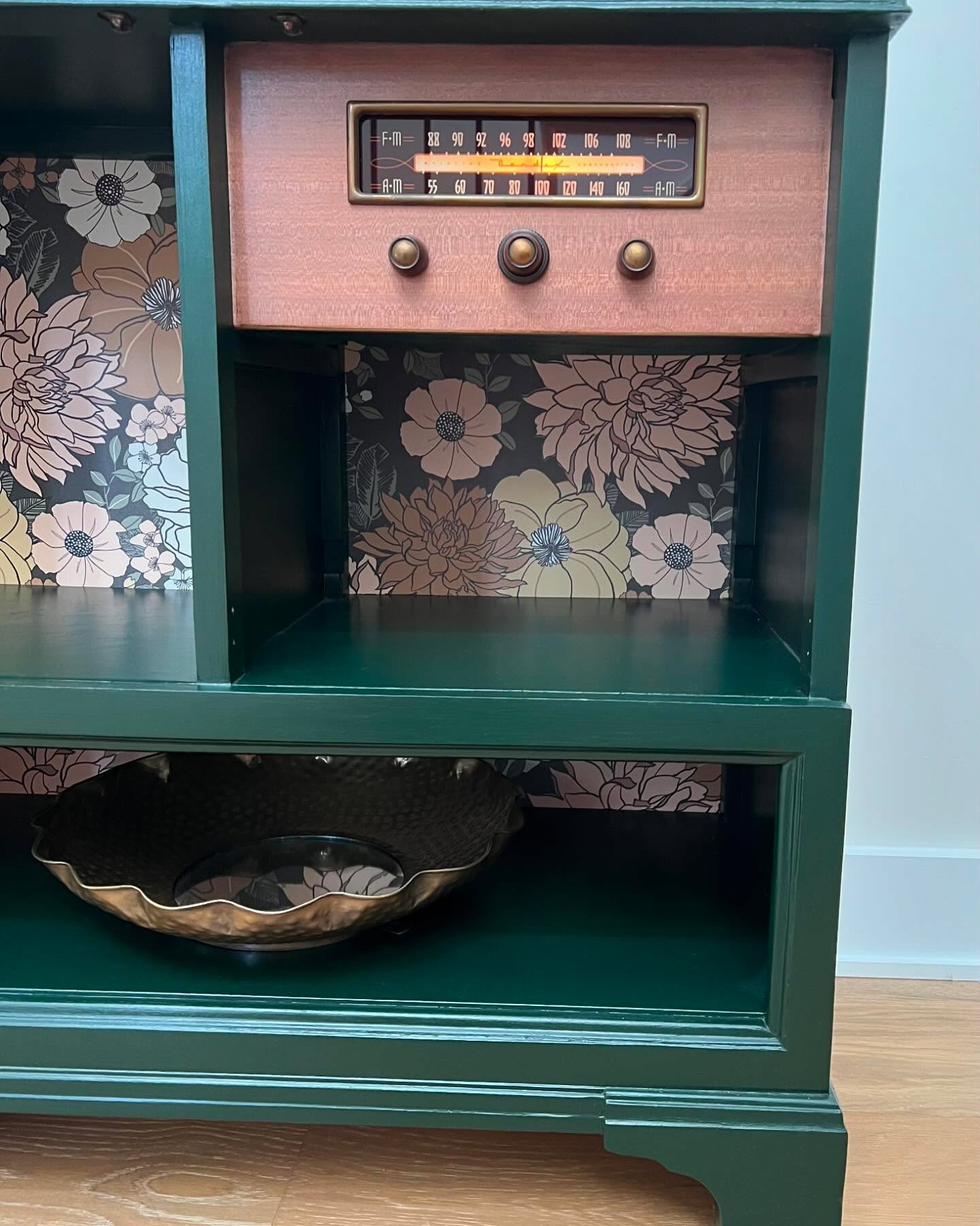 Sneak peek of this vintage cutie! Mahogany radio cabinet from the late 1940’s, revived with dark green paint and large floral wallpaper. A conversation piece for your entryway or living space.