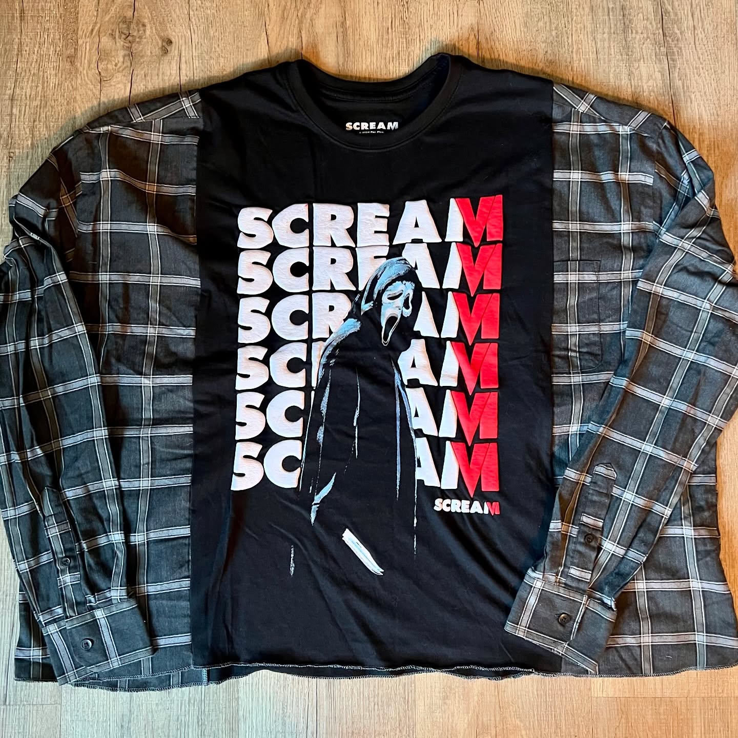 Ready to slay this spooky season? These one-of-a-kind, upcycled Scream flannel tees are the perfect combo of horror chic and grunge vibes. Handcrafted for a killer look that’s comfy and unique—just like you. Don’t wait for a jump scare, grab it before it’s gone for good! 🎃🖤
#UpcycledFashion #ScreamStyle #UpcycledHorror #HandmadeFashion