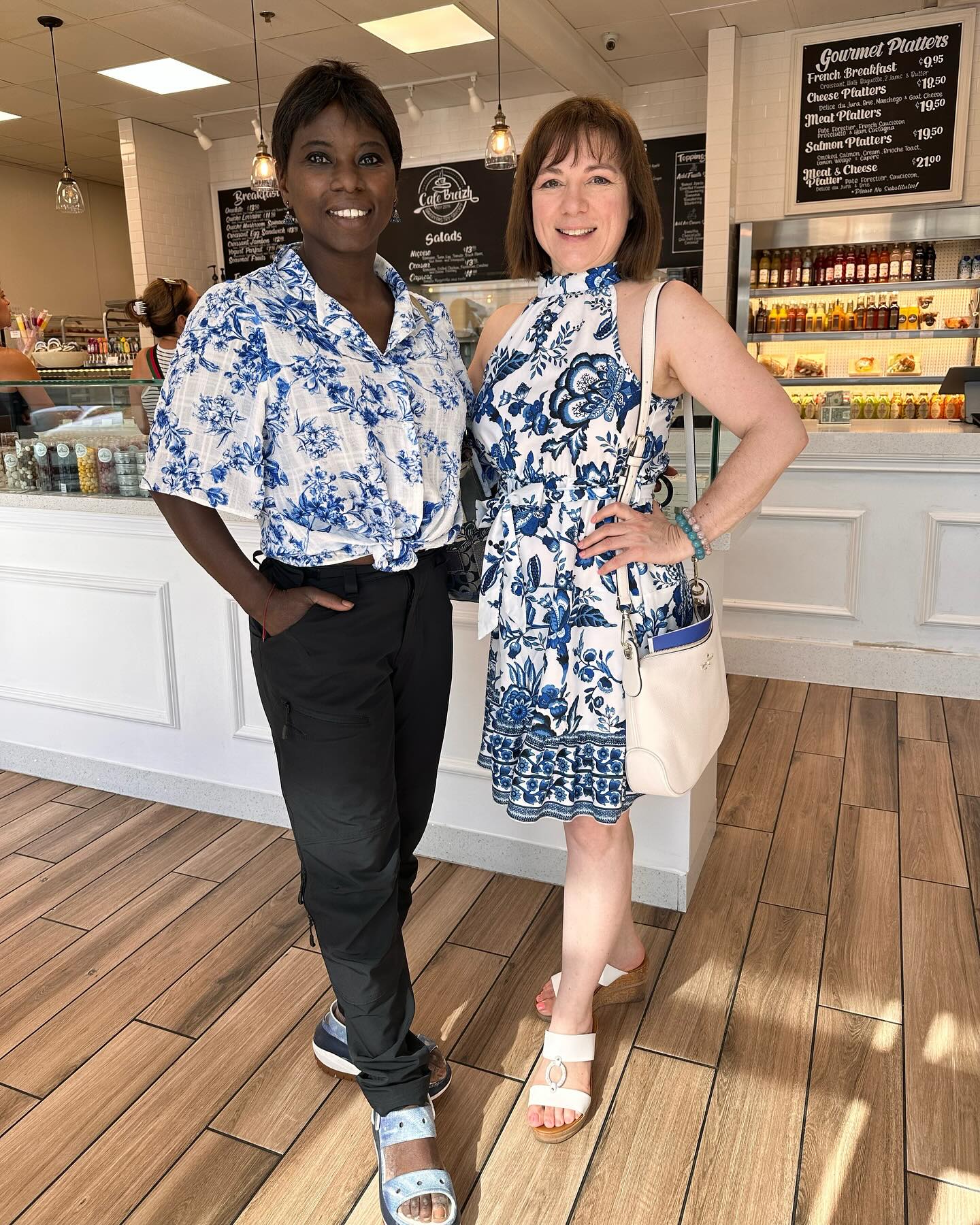 Started my beautiful morning today with my amazing friend whom I have admired since I was a young girl. I love her, her determination and strive for success and change! A pioneer in the world of figure skating ⛸️⛸️ as an olympic champion, @suryabonaly1 (Surya Bonaly) defied conventions with daring figures, such as her famous backflip. Today was our catching up time at the reopening of the @cafebreizh (Cafe Breizh) after they closed for vacation. We did not coordinate, but we ended up matching together! lol… 💙🤍 When great minds think alike!!! 😄😁❤️
