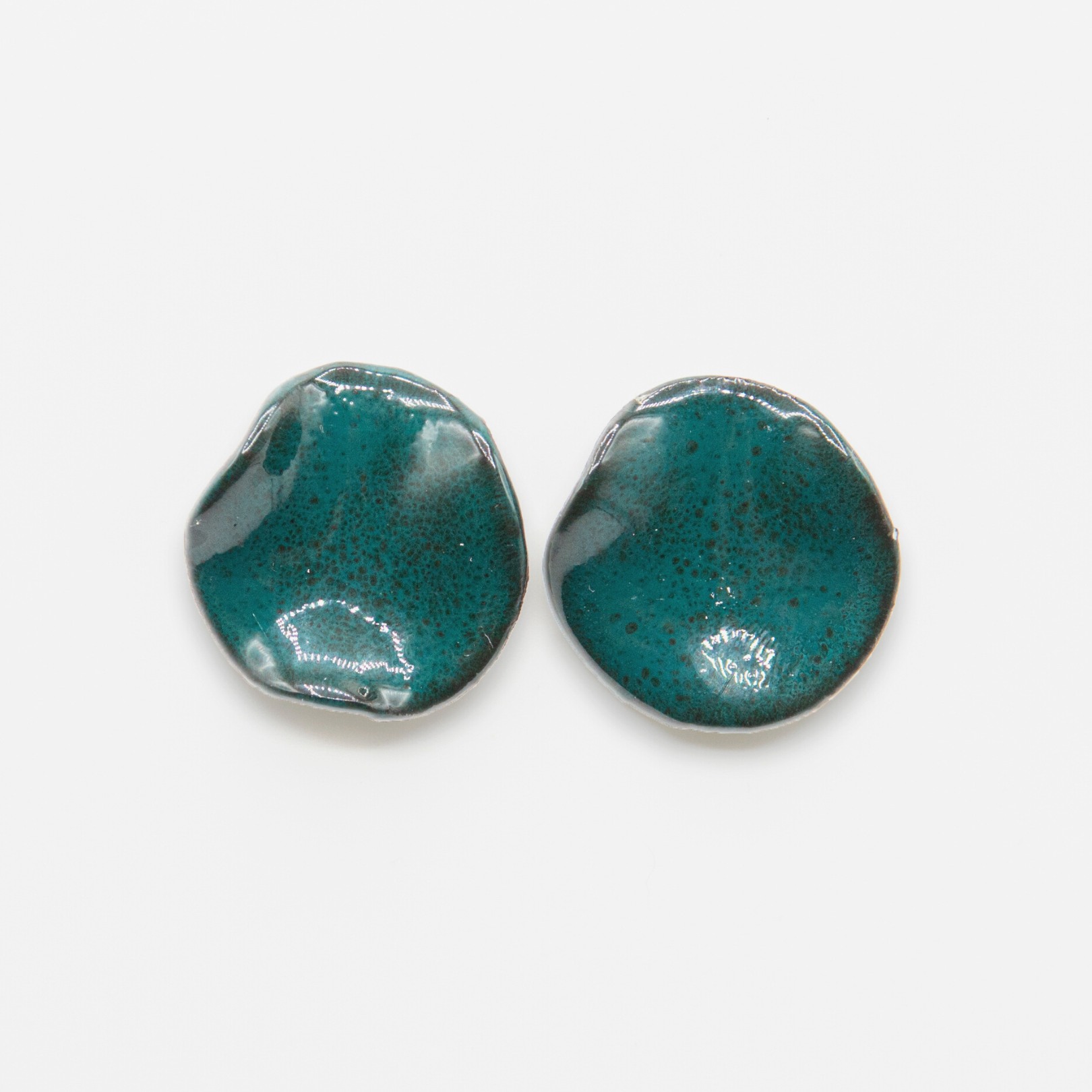 Explore new ways to style your outfit with our Céramique Collection!
The perfect addition to any outfit. Handmade black clay is finished with a shining green enamel to add a particular character to these earrings, composing an eclectic and elegant form. Suspended by sterling silver studs, they are also lightweight and hypoallergenic.
Experience the beauty and versatility of ceramics with our jewellery collection, where inspiration and creativity converge to express your unique personality.
Free UK delivery for all orders + 10% OFF your first order with code WELCOME.
www.ornamental.co
#ceramique #ceramicjewelry #ceramicjewellery #clayjewelry #clayjewellery #ceramics #handmadejewelry #handmadejewellery #handmadejewels #handpaintedjewelry #handpaintedjewellery #madewithhands #jewellery #jewelleryaddict #jewellerydesign #jewellery #jewellerygram #jewellerylover #jewellerydesigner #ukbrand #newcollection #newcollection2023 #ornamentalcommunity #ceramiquecollection #ornamental
