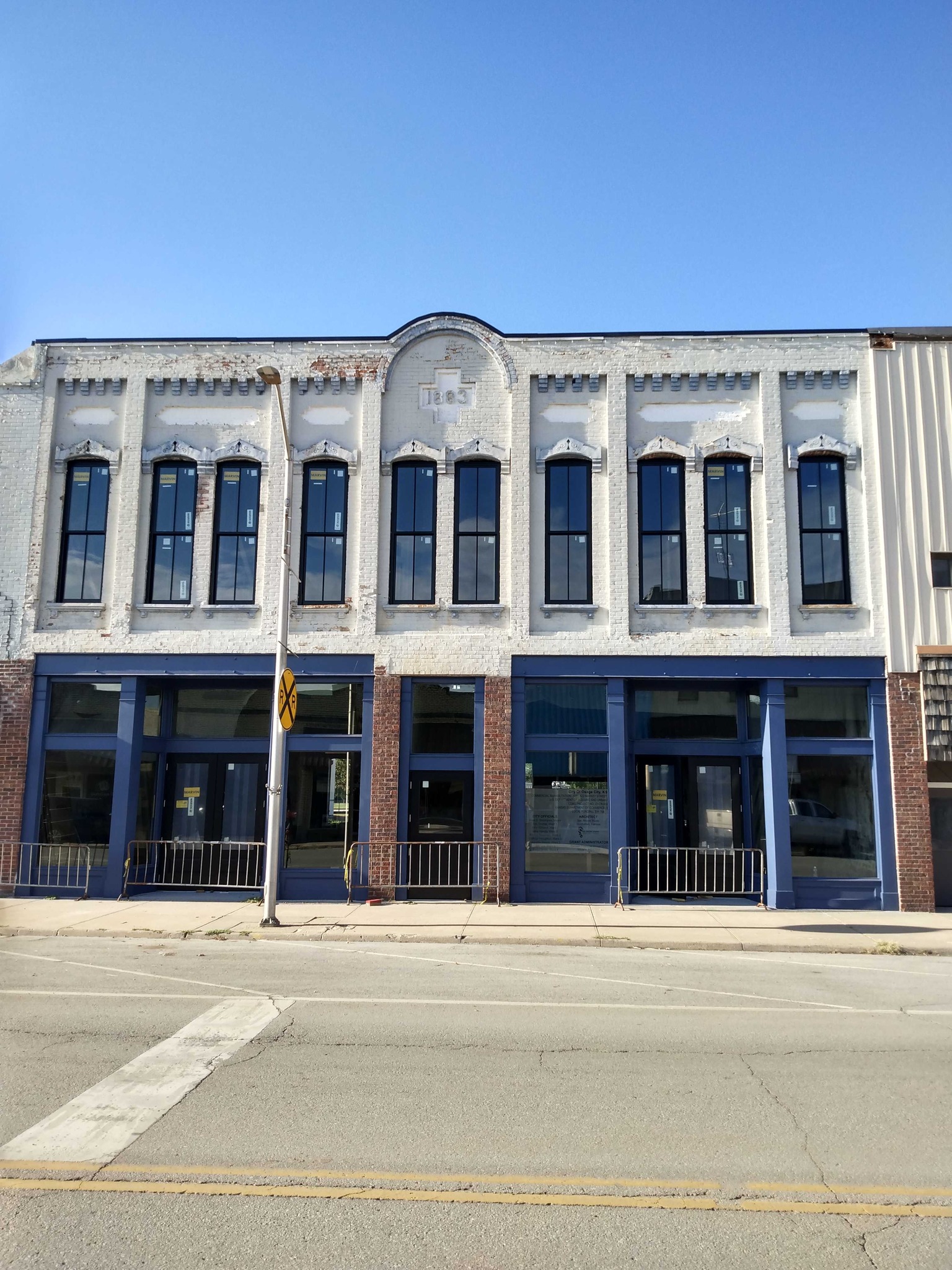 Look what we have here... a full set of windows! They were custom-made to fit the large openings and meet historic rehab standards, as well as reduce noise since we're near the railroad tracks.