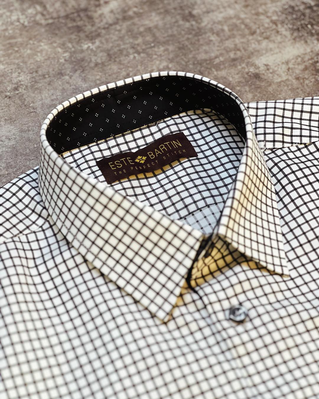 A checkered shirt with a contrasting inner lining creates a subtle but noticeable difference when the shirt is slightly unbuttoned or sleeves are rolled up.
Design something you fancy here at Este Bartin ✂️
#estebartin #mensfashion #madetomeasure #tailoredshirt #customshirt #checkeredshirt #formalshirt