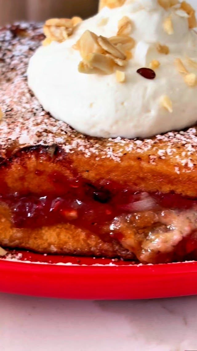 National Sandwich Month: Day 7 Elevated PB&J. The childhood classic, all grown up. By special request from @bevalger
Homemade peanut & cashew butter blended with mascarpone for extra creaminess. 🍓🍞🥜. Layered with homemade mixed berry jam, sandwiched in French toast brioche. Finished with whipped cream, chopped peanuts, coconut, powdered sugar, and a dusting of cocao.
Drop me a comment with some ideas on what to make next!
🥪 Follow along for the next sandwich!
#SandwichMonth #PBJ #FrenchToast #FoodShorts #NationalSandwichMonth