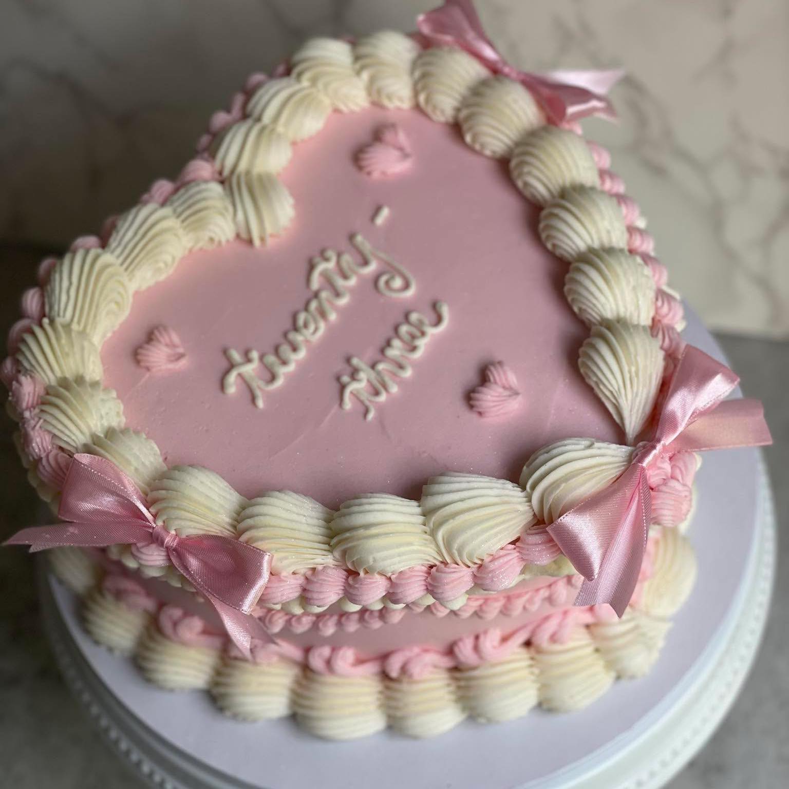 Please keep these fully customizable vintage heart cake orders coming because I can’t get enough! Clients can choose their cake flavor, add a filling, select colors, and even add wording, cherries, bows, and edible glitter 🍒🎀✨🧡
Order yours today at https://www.frosteatlove.net/online-ordering?lightboxOnScreen=true&itemId=1ba7303f-f3bd-4282-ae19-e0b8e42cbee9§ionId=ec731565-25ed-40ff-bd2a-cf7c3ade35e3&menuId=5f780cf2-1262-45a6-9e71-bf8bbb18719f