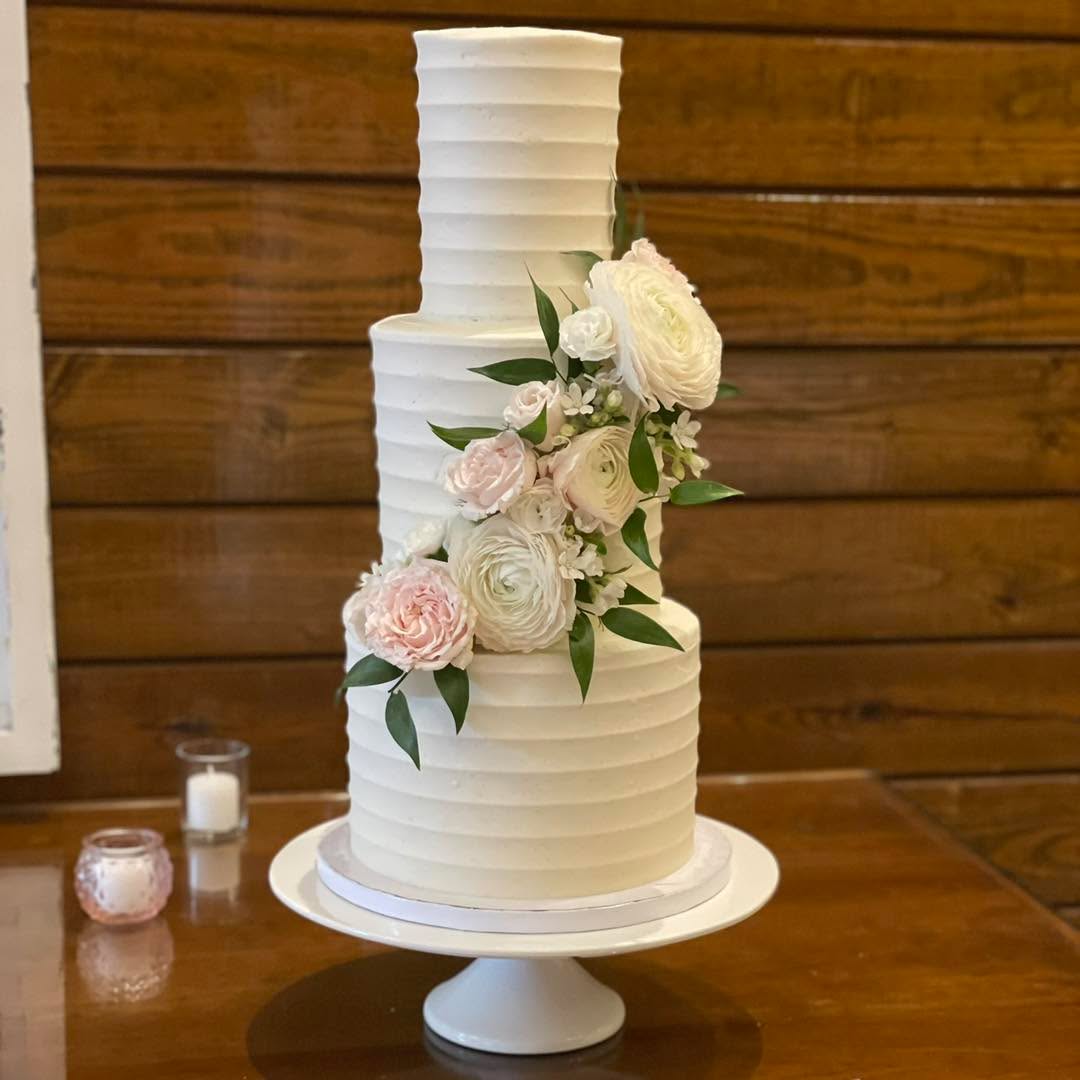 Fall wedding season has begun!
Looking through last season’s cakes, I was shocked to realize I never shared the cake photos for one of the sweetest couples I ever had the pleasure to work with, Brian and Ryley. They wanted some fun flavors for their guests, and they gave me my first challenge with taller wedding tiers- challenge accepted! The most happiness to the both of you as you have now celebrated your first year anniversary!!! At the event barn at Mt. Ida Farm #fallweddingseason #fallweddings #bakedfromscratch #beautifulmemories #ihavethebestclients #smallbusinesssaturday #love #blessing #frosteatlove