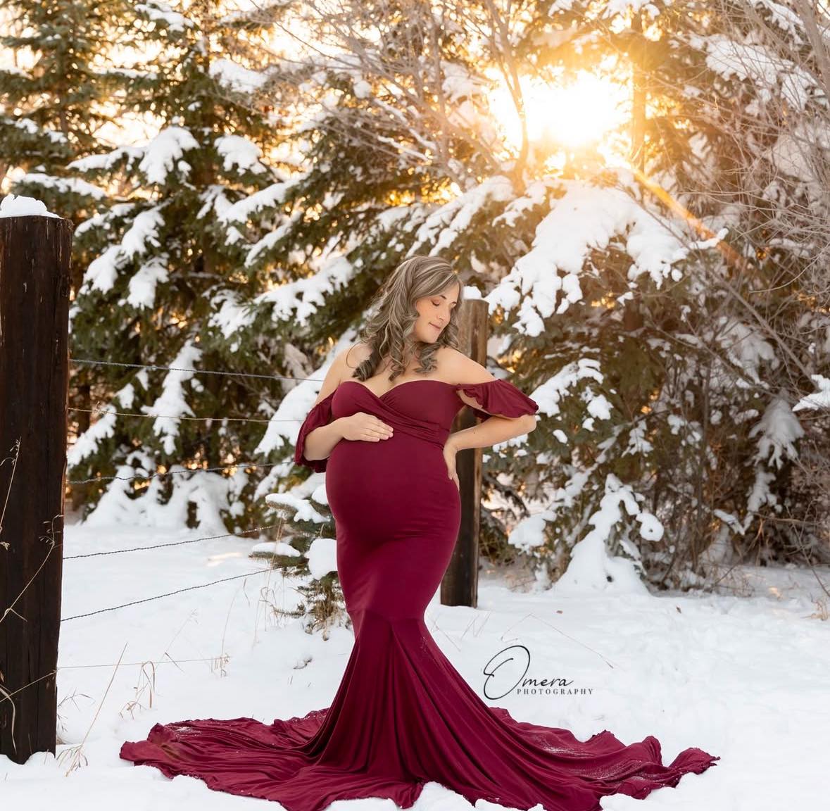 Everyone wants to see more of my Client Closet so I’m going to be featuring some of my favourite dresses in my posts over the next little while!
This is the Serenity from Sew Trendy, and it’s absolutely stunning! I’m so heartbroken that this designer closed because the majority of my dresses were purchased from them.
The Serenity features a full bell skirt with a side slit (can be pulled closed like in these images unless you want to show a pop of leg), it’s double lined to the knee, and it has the most lovely flutter sleeves. I have it it burgundy, lilac, mauve, and champagne (although I don’t have photos of anyone wearing the last two colours yet).
It can also be paired with a toss train for extra drama!
What do you think??