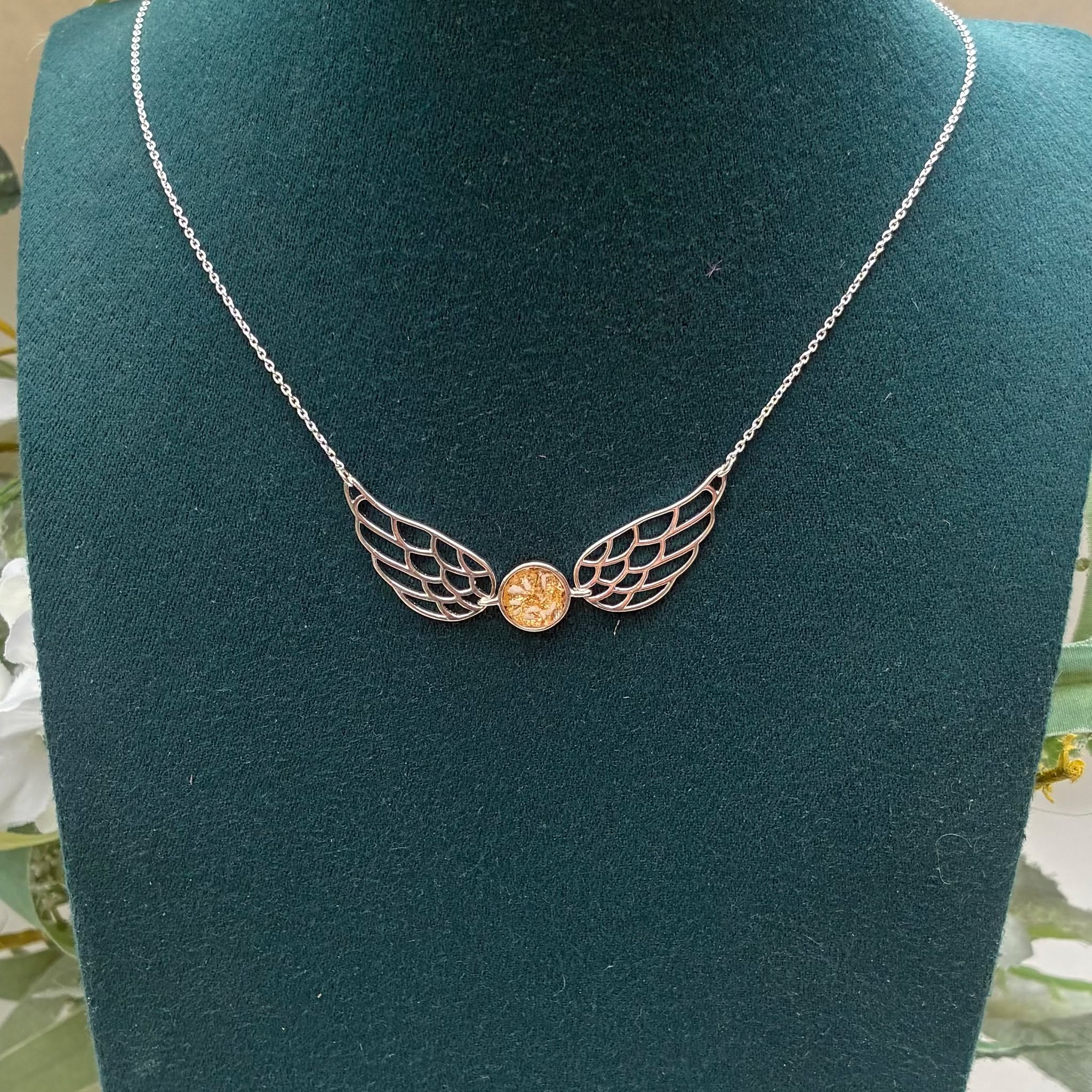 Anyone else getting Harry Potter vibes from this one? Really beautiful winged necklace with central bezel which can be done in any colour and can enclose ashes, hair, fur or more. This one is new to the website and is a really pretty statement piece. Made from 925 silver it is £102 and available in time for christmas! Drop me a message or pop over to the website at www.meadowmemorials.co.uk