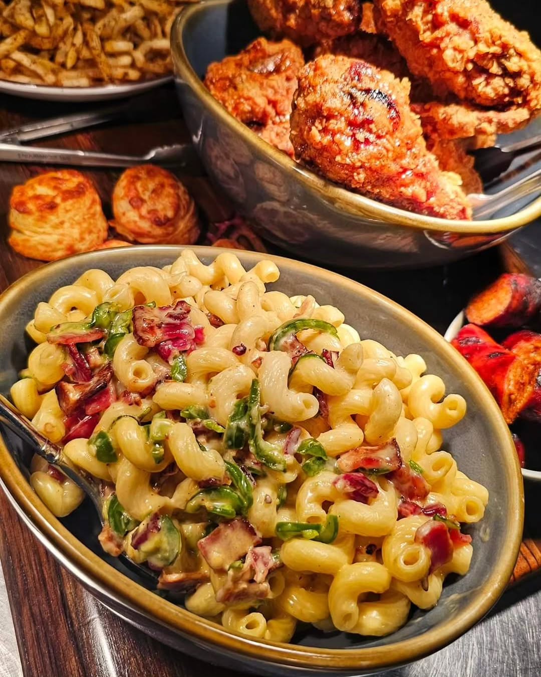 FRIED CHICKEN FAMILY MEAL | 48-hour buttermilk brined chicken (10pcs), special seasoning & flour blend, spicy maple butter, chorizo sausage, jalapeño & bacon mac'n'cheese, house pickles, fries, white cheddar biscuits.
----
Know you're having guests over and don't want to cook? Our family meals are excellent options. Give us a call to pre-order: 306.297.3315