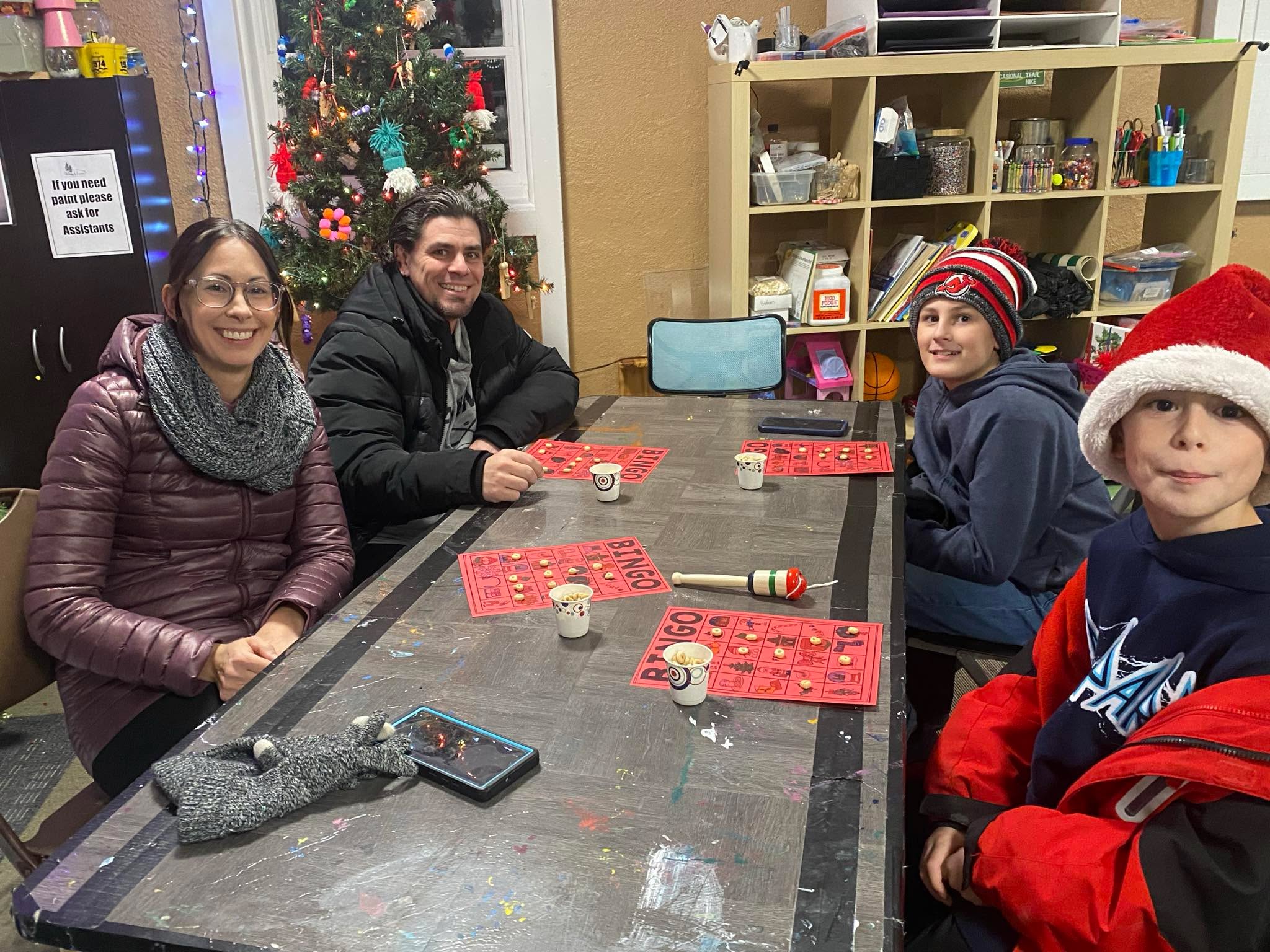 Holiday Bingo: Rescheduled Due to Flash Freeze Predictions
If you missed last week's Holiday Bingo, don't worry! We're hosting Holiday Bingo again this week, but the game originally scheduled for tonight has been moved to tomorrow, Saturday, December 20, 2025, at 6:00 p.m. This change is due to a predicted flash freeze. Check out the fun captured in these photos from last week's event, and we hope to see you tomorrow!
**A Recap of Last Week's Event:**
The fantastic evening on December 12, 2025, kicked off with Holiday Bingo at the Youth Center. Participants arrived steadily, bundled in thick coats to protect themselves from the winter chill. With exciting prizes at stake, everyone grabbed a festive Bingo sheet and a cup of Cheerios before the game began. Holiday music played softly in the background as the numbers were called. Each time someone shouted "Bingo," the excitement in the room grew. Although the event was aimed at children, the adults enjoyed themselves just as much. The evening concluded successfully, with all participants winning at least one prize. As they said their goodbyes, everyone eagerly looked forward to next time!