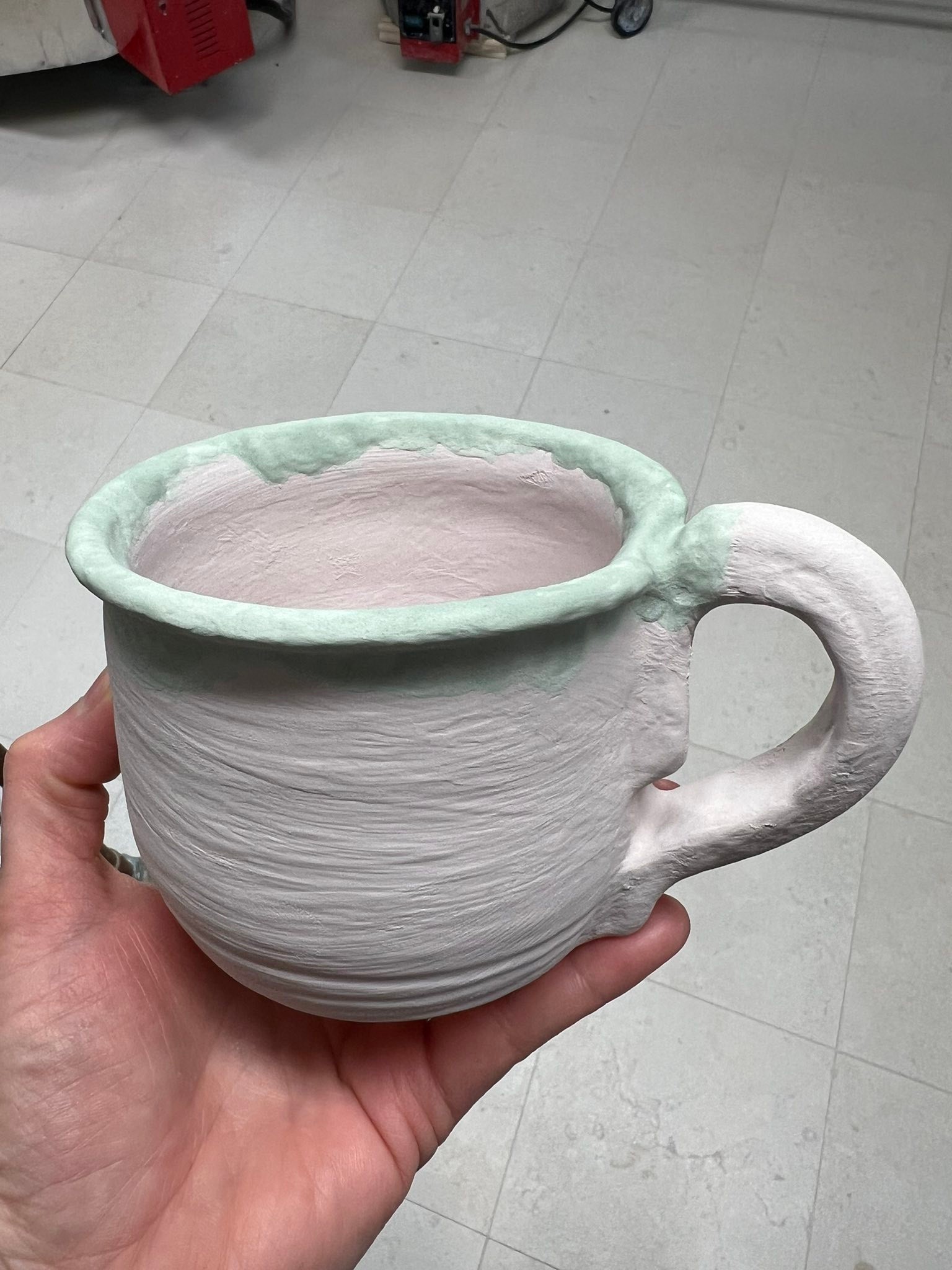 Lost one! Oops! But one jar will make it. 4 mugs for final firing… we’ll see how the glaze will turn out next week. Nice to get back in the studio and be with people making things.