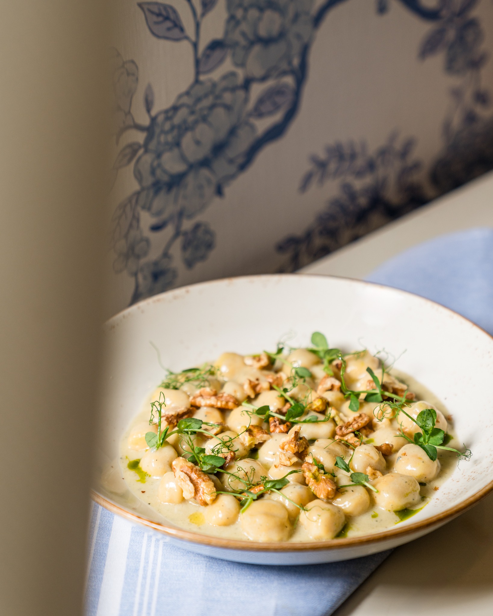 Our house-made potato gnocchi, tossed in velvety gorgonzola cream and finished with toasted walnuts. A house favorite, beautifully simple and indulgent.