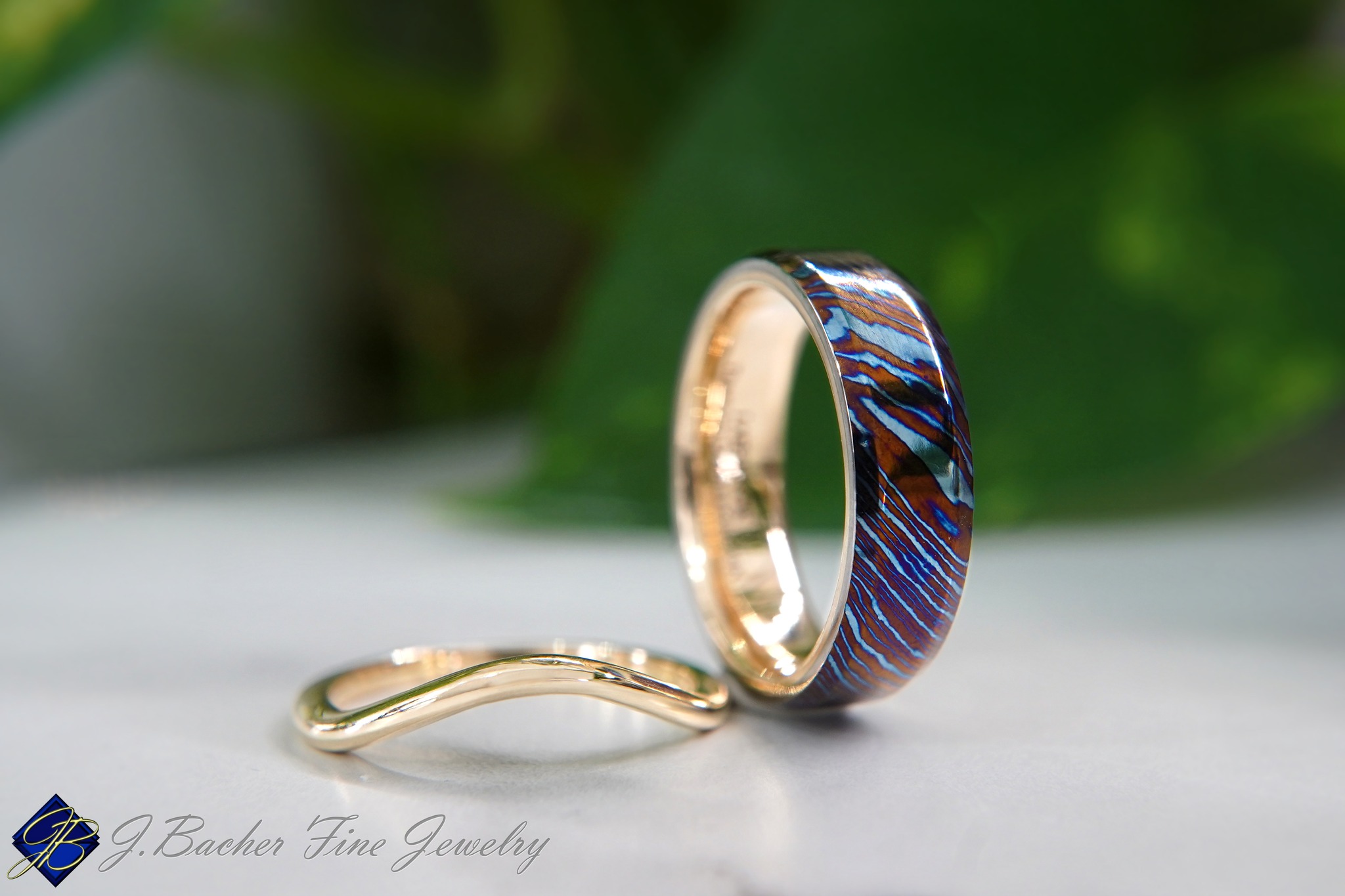 ๐Kailee & Andy
A bit of a late share, but massive congratulations nevertheless!
A beautiful pair of wedding bands, each thoughtfully chosen to reflect their own style. Hers is a classic, sleek yellow gold contour band, perfectly complementing her engagement ring. His band is a custom yellow gold and titanium Damascus piece - bold, distinctive, and truly one of a kind.
Weโre honored to have been part of such a meaningful chapter and wish you a lifetime filled with love, laughter, and unforgettable moments together. Congratulations! โค