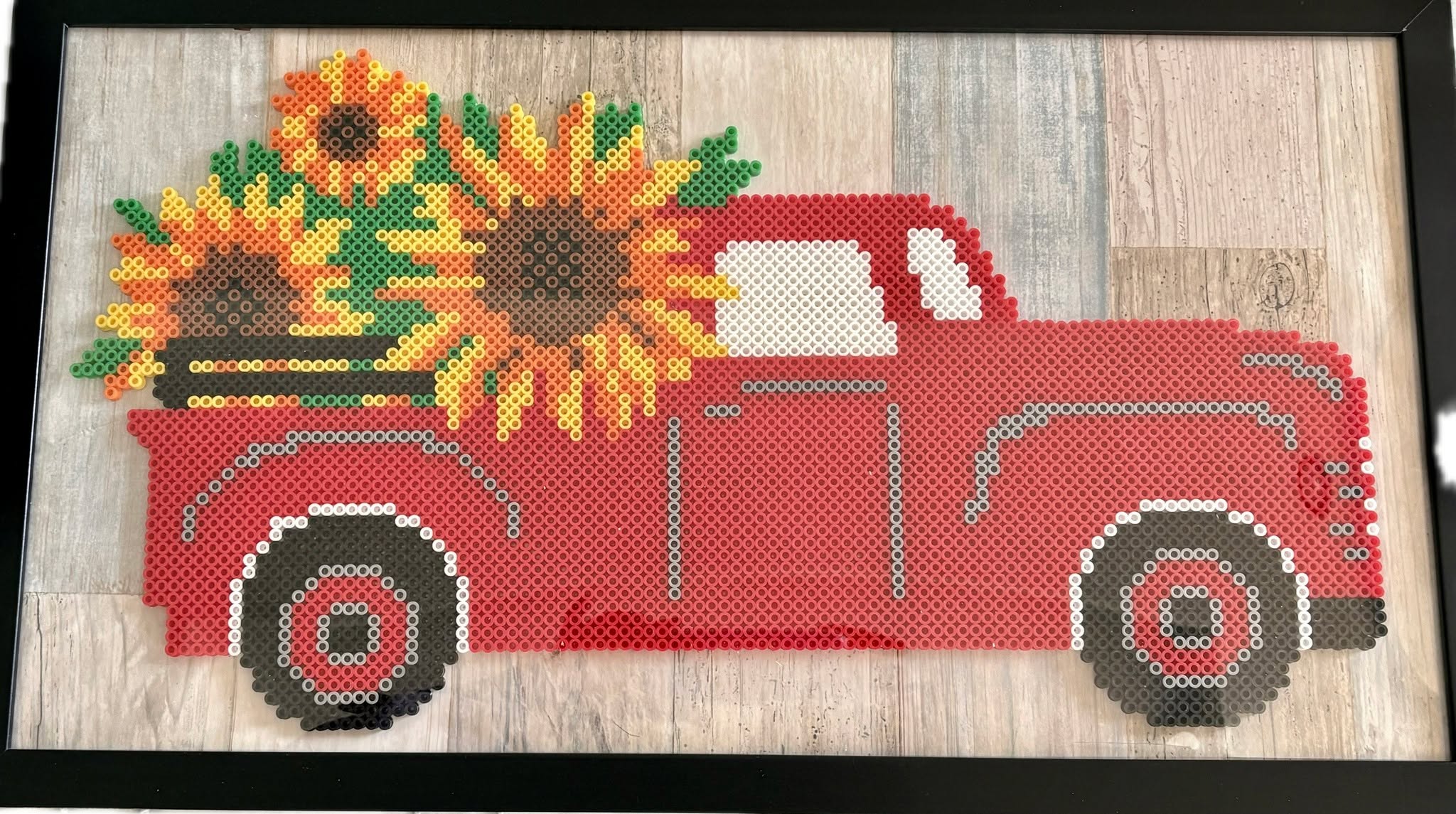 This project contains approximately 6,042 beads and took me 16 hours to complete. The frame size is 12 by 22.