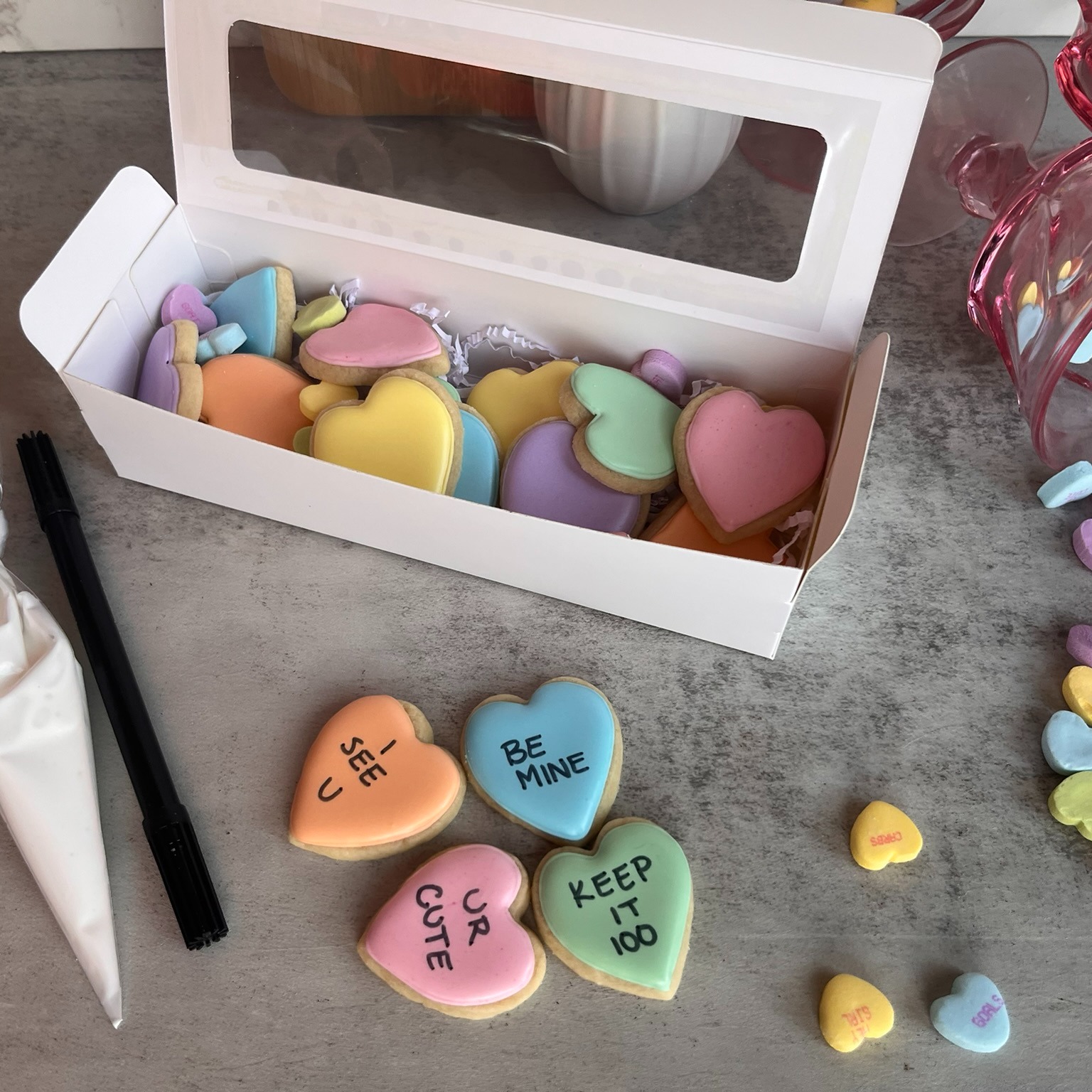 Valentine's Day is now less than THREE weeks away, so if you haven't already ordered treats or made plans, consider this your complimentary reminder! Plus, everyone is still fairly snowed/iced in, so why not check something off your list?
This year, Frost Eat Love is offering a few favorites, as well as new and customizable treats. Who wouldn't want to write their own messages on buttery-soft cookies or a cookie cake with options including edible markers (for cookies) and more frosting? Check out the sugar cookie decorating kit, custom chocolate chip cookie cakes, and the year-round client favorite: the build-your-own 8" vintage heart cake!
Ordering is fairly straightforward on FrostEatLove.net/online-ordering, with payment options now including PayPal and Apple Pay. What desserts are you planning on ordering, OR what treats do you need to comment below and tag your loved one to take as a hint? I've got you covered!!!
Please note: As of 2/5, Frost Eat Love’s pick up location will be the parking lot of Joe Bean’s on Timberlake Road!