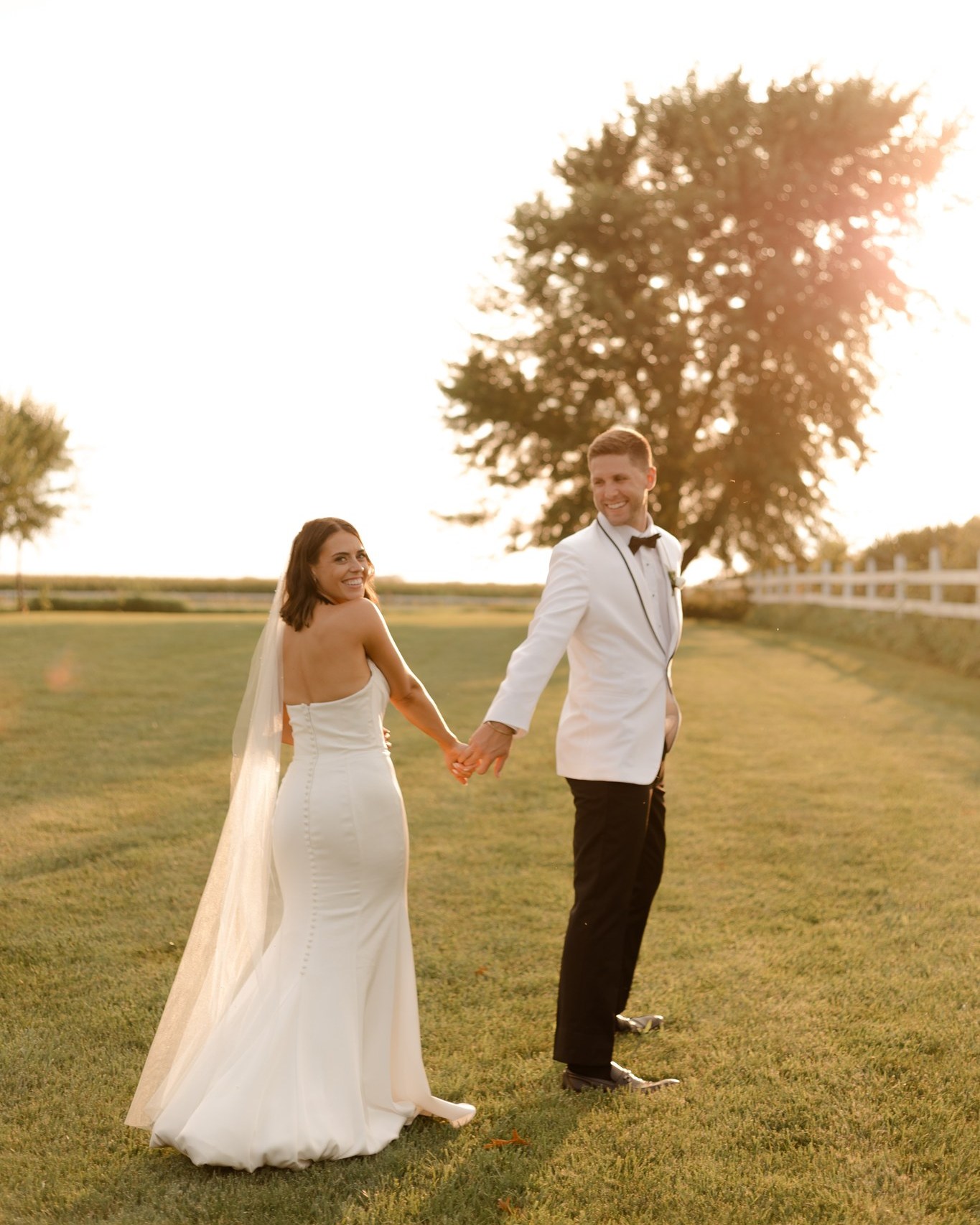 Bailey + Colin
8.9.25
love story - Colin & I met through a mutual friend & started our relationship off as friends, before finally making it official & moving in together in the Des Moines area! It didn’t take long for us to realize that we fit together perfectly. We balance each other out & are always having fun!
the dress - My favorite part about my dress was the fit. I felt like it was so comfortable & classy, & I got so many compliments!
most memorable moment - While the whole day was memorable, my favorite moment was exchanging our vows in front of our friends & family. It was such a special moment.
advice - My biggest piece of advice for future brides would be to relax & enjoy every moment! It’s true that the day flies by. Do not stress about the small details because the only person who knows about them is yourself, & everything that happens happens for a reason! Focus on enjoying yourself & spending time with your partner.
Dress + Veil: @marabrides
Venue: @1868farmhouse (My venue was AMAZING. They helped with literally everything & made my day seamless. From filling champagne glasses prior to the ceremony, setting up & tearing down decor, suggesting vendors, meeting for details, steaming dresses, coordinating the rehearsal, picking up our late-night snack, & SO much more!)
Florals: @m.klyn.floral
Live Painter: @fruitedpaint
Grazing table: @lynneleeexperiences
Catering: @hickoryparkamesia
Desserts: @stalliessweets
Macarons: @sweetbeesmacs
Hair + makeup: @afterglowprostudio
Photography: @ivoryandbliss
Content Creator: inmotionbysyd
DJ: @djnicknystrom (We got SO many compliments on our DJ. He has some add-ons that are so fun (like cold sparklers), he reads the room so well & keeps the fun going, & he sends some content that he captures throughout the night!)