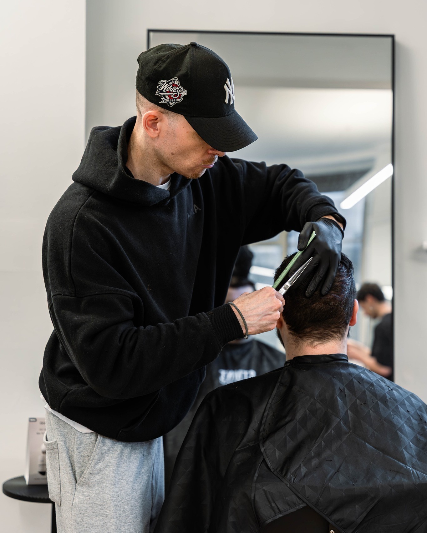 Steady hands, honest work. Another day in the Manchester barbershop.
