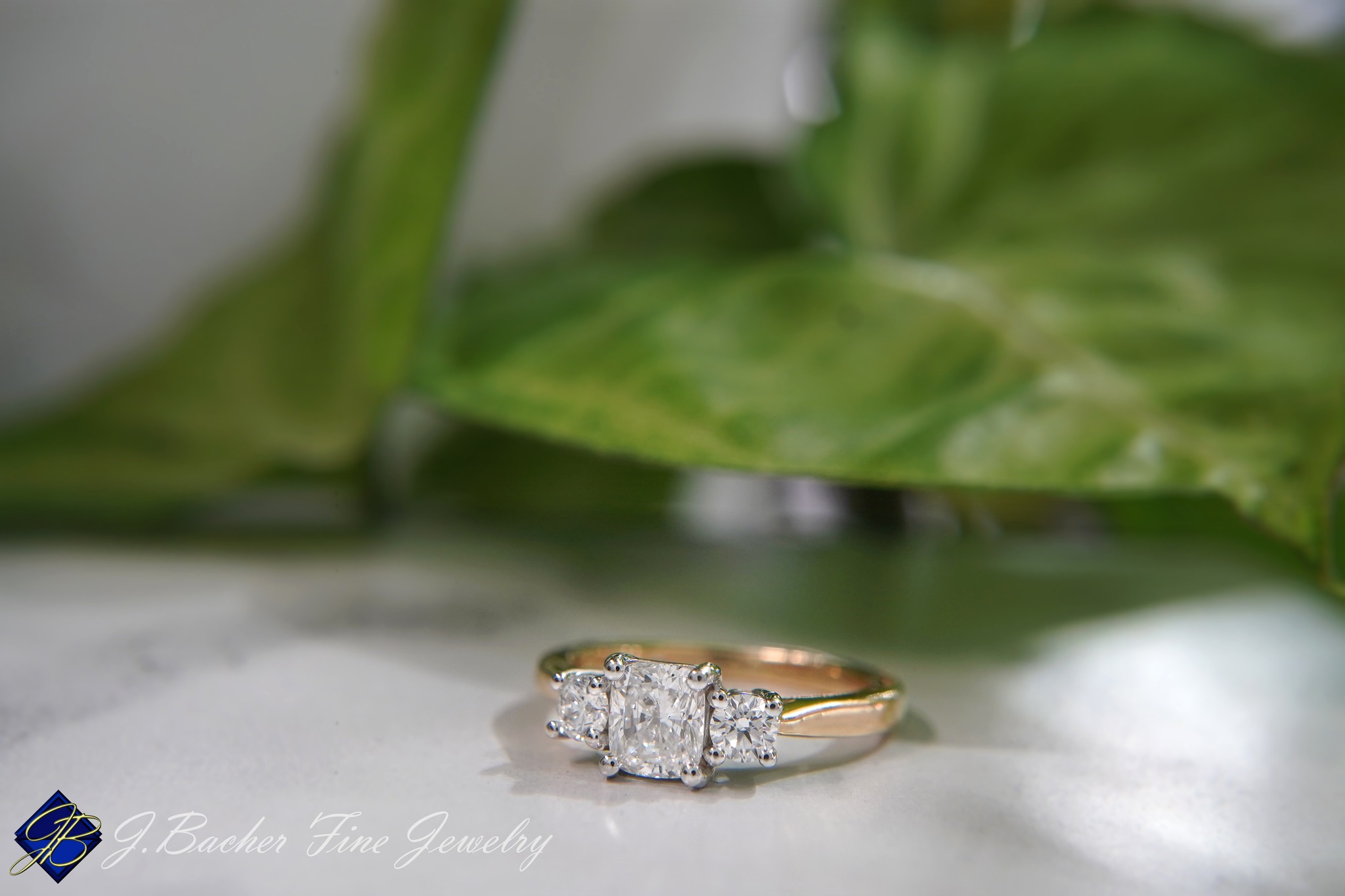 ๐ Congratulations to another sweet couple on their engagement!
This timeless three-stone engagement ring is a beautiful symbol of past, present, and future. Crafted in yellow and white gold, it features a stunning cushion-cut diamond center complemented by two brilliant round diamond accents - a classic and elegant design.
Thank you both for shopping small with us for this special project. โค