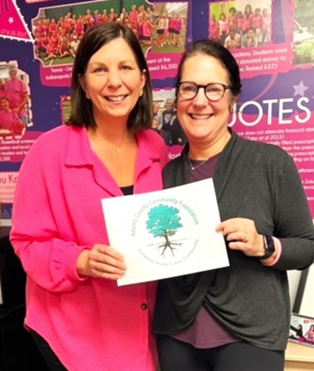 The Adams County Community Foundation (ACCF) is pleased to announce that Indiana Women in Need (IWIN) Foundation has recently awarded a grant for Adams County Survivor Support. Indiana Women in Need provide support for women experiencing breast cancer. With this grant award, IWIN provided support to Adams County Cancer patients with necessary items need for their treatment and to help with other experiences. If you know someone that could use this assistance, please contact IWIN at (317) 475-0565 or email: info@iwinfoundation.org.
This ACCF grant was made possible through unrestricted fund sponsored by the Elizabeth ‘Liz’ DeVoss Community Enrichment Fund.
Elizabeth “Liz’ DeVoss Memorial Fund was established by ‘Liz’s’ friends, Dan and Bette Ross. They report that Liz made a significant impact in many people’s lives in Adams County. The average person would never know this as she worked with a special group of people who tried to keep their abuse confidential and lives private. Elizabeth was a tireless fighter for crime victims. Her of work centered around women and children.
Pictured: - Debbie Laswell, Indiana Women in Need (IWIN) Foundation Development, Program Director and grant writer is with Sue Wynne, IWIN Foundation Operations Director after learning they got an Adams County Community Foundation (ACCF) grant award. The IWIN organization’s mission is to serve breast cancer patients by relieving emotional, physical, and financial burdens.