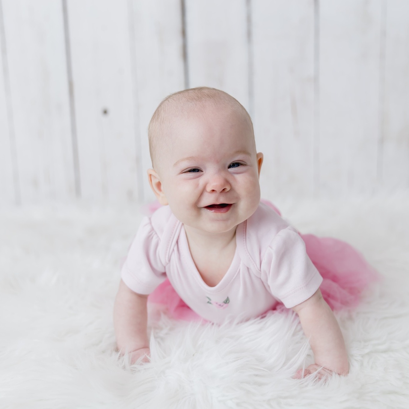 Happy baby finding her toes and all smiles!