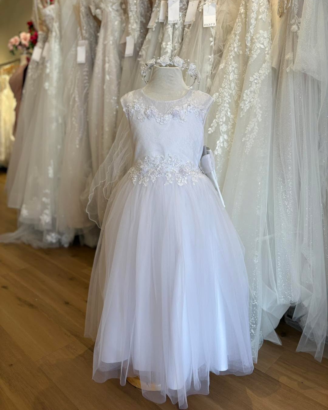 First Communion is almost here 🤍✨
& the finishing touches matter…
From sweet little gloves to the perfect crowns & veils, we’ve got all the last-minute accessories to complete her look.
Stop in & shop with us Tuesday–Saturday—no appointment needed ✝