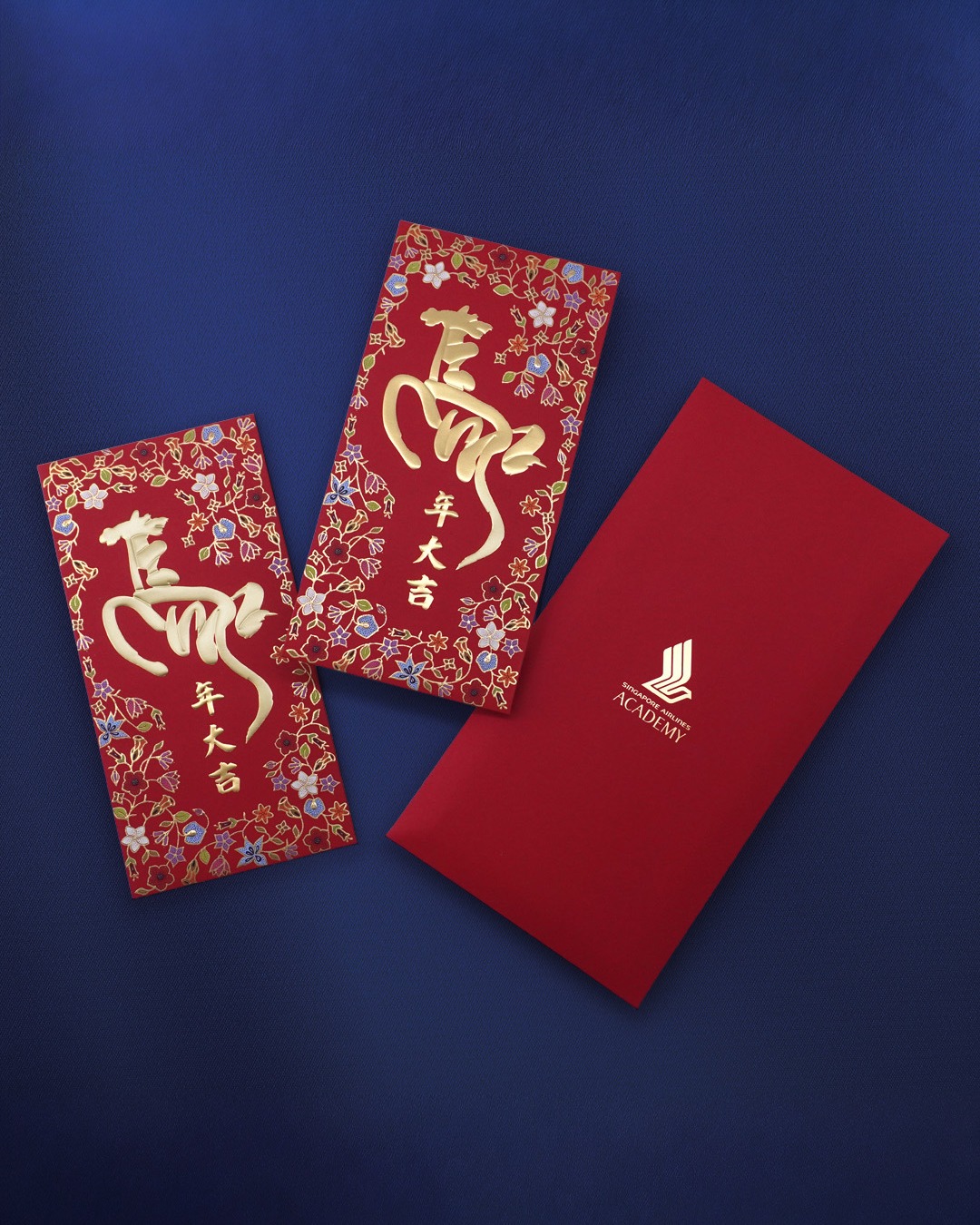 2026 I Singapore Airlines
For Singapore Airlines, the goal was to create a design that feels true to the brand while reflecting the spirit of Chinese New Year. Singapore Airlines is Singapore's national airline and is widely recognised for its premium service and hospitality. We proposed several art directions, and the final concept paired horse calligraphy with SIA-inspired motifs, finished with layers of hotstamping, embossing, and spot UV. The result feels refined, celebratory, and distinctly on brand, housed in a clean minimal envelope.
Thinking about your next CNY campaign already? Let’s talk. 🐎🧧
#redpackets #redpacket #redpockets #angpao
#angpow #laisee #hongbao #红包 #利是 #利是封 #CorporateGifts #CustomPrinting #ChineseNewYear #RedPacketDesign #CNYCorporate