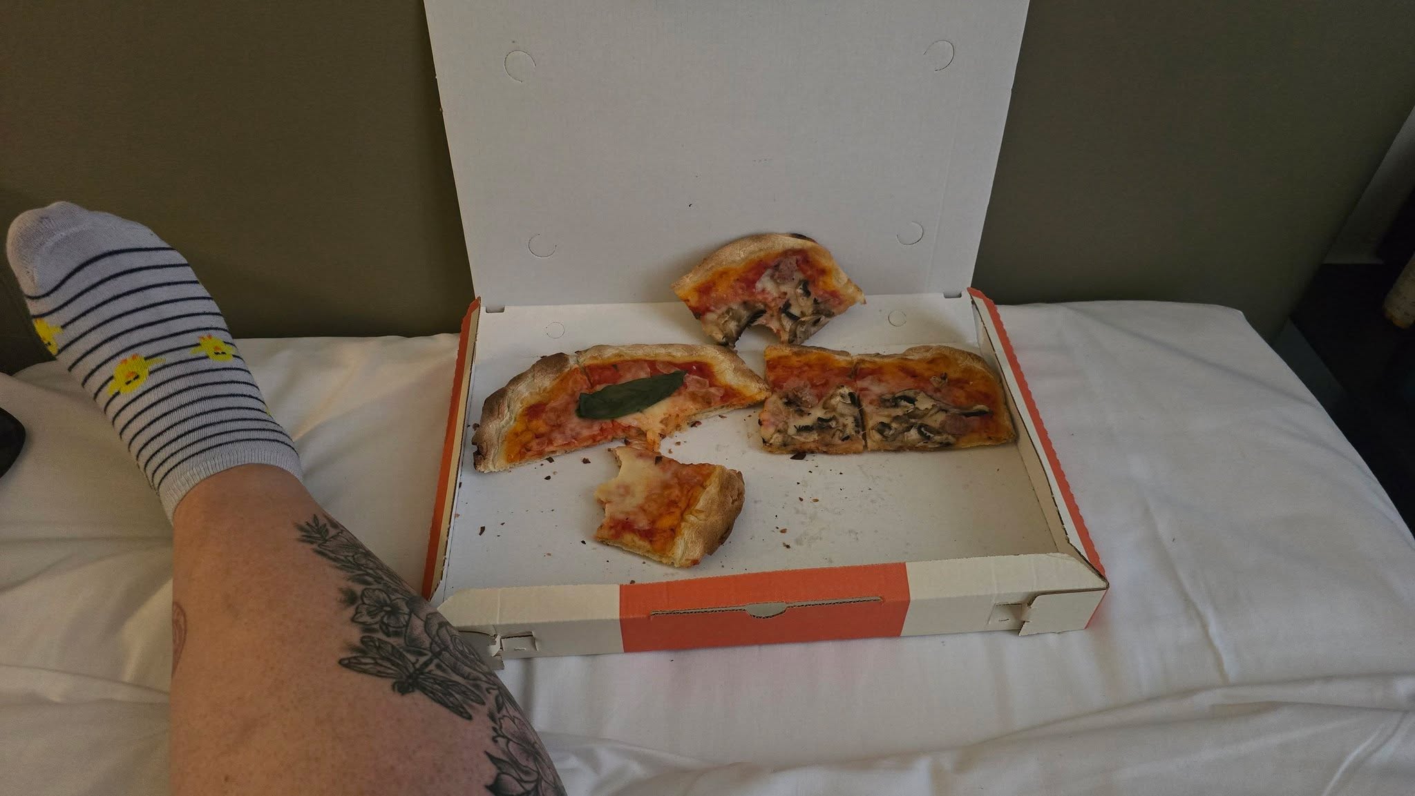 My legs and feet are pissed at me. Pizza and wine in bed before we head out for some gelati