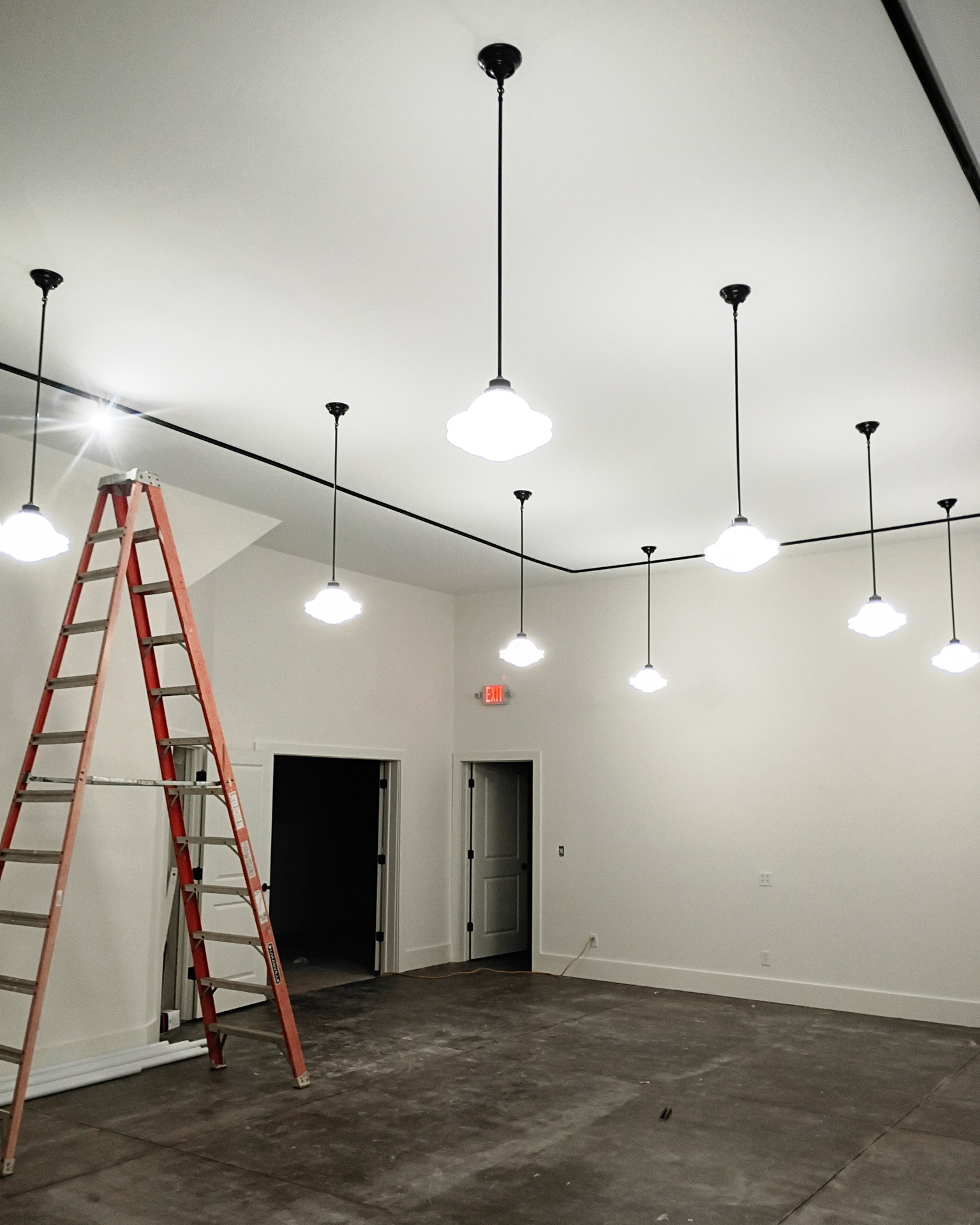 Making major progress throughout the building! We've completed the space for @hornandivorybooks , which is now moving in. Tile is going in the bathrooms. The floors are polished up for The 1883 Guesthouse. And the space for Forty Barrels Coffee + Kitchen is getting painted.