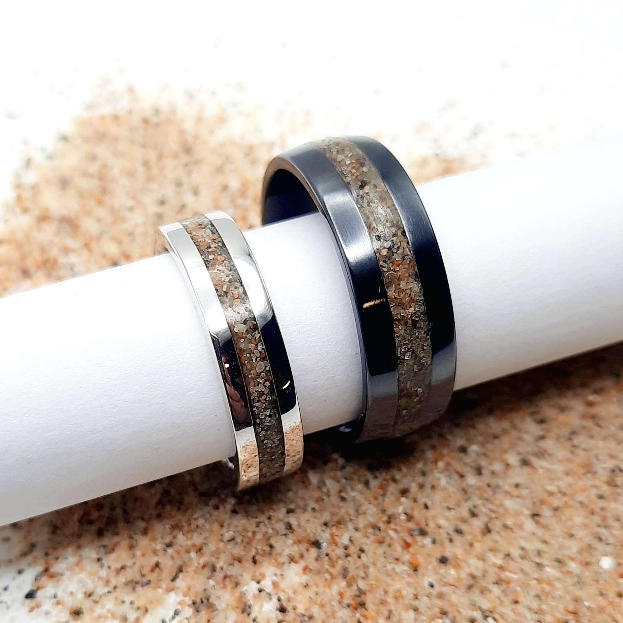 I absolutely love the idea behind these wedding rings — embedded with sand from beautiful Kiama Beach, where this lovely couple live and were married. How meaningful is that?
The gents’ ring was handcrafted from Black Zirconium, machine lathed with a darkened oxide finish, while the ladies’ ring was created in 18ct white gold. Sand from the beach was carefully inlaid into each ring using resin, then polished to a smooth finish on the polishing wheel.
A perfectly matching pair of rings, carrying a piece of home and a memory they’ll wear forever.
What do you think?
.
.
.
#resinjewellery #weddingringset #customrings #beachweddings #bespokerings #customjewellery #customisedjewellery #personalisedjewellery #uniquejewellery #ydjewellerydesigns
