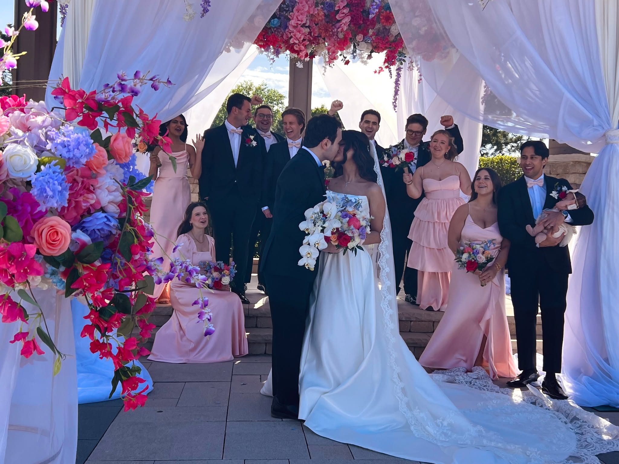 We love when clients (like this mother of the groom) take the time to share their experience! Thank you, Alisa, for sharing yours. Cheers to your son and daughter-in-law! We wish them the very best!
"Elena and Oleg, you truly outdid yourselves! Everything was absolutely perfect. From the moment I met both of you and saw your incredible work, creativity, and attention to detail, I knew SaniMar was the perfect choice for our son’s wedding.
The florals and décor were beyond magnificent - the chuppah, bouquets, centerpieces, pipe and drape - every detail was even more beautiful than we ever imagined. Elena, you are truly the floral queen! I so appreciated the time and care you took to fully understand our vision and then bring it to life so flawlessly. The flowers were breathtaking - not only the stunning blooms you selected, but the artistry and elegance of every arrangement you created.
And Oleg - wow! The work you and your team did with the pipe and drape completely transformed the space. You understood the challenges of the venue and made sure every detail was handled perfectly. Walking into the ballroom felt like stepping into a fairytale.
Our guests could not stop raving about how spectacular everything looked, and neither could we. We are beyond grateful for your talent, professionalism, and dedication to making the day unforgettable.
Thank you again for creating something so magical. We could not be happier and are so grateful for all that you did to make our day truly special."
