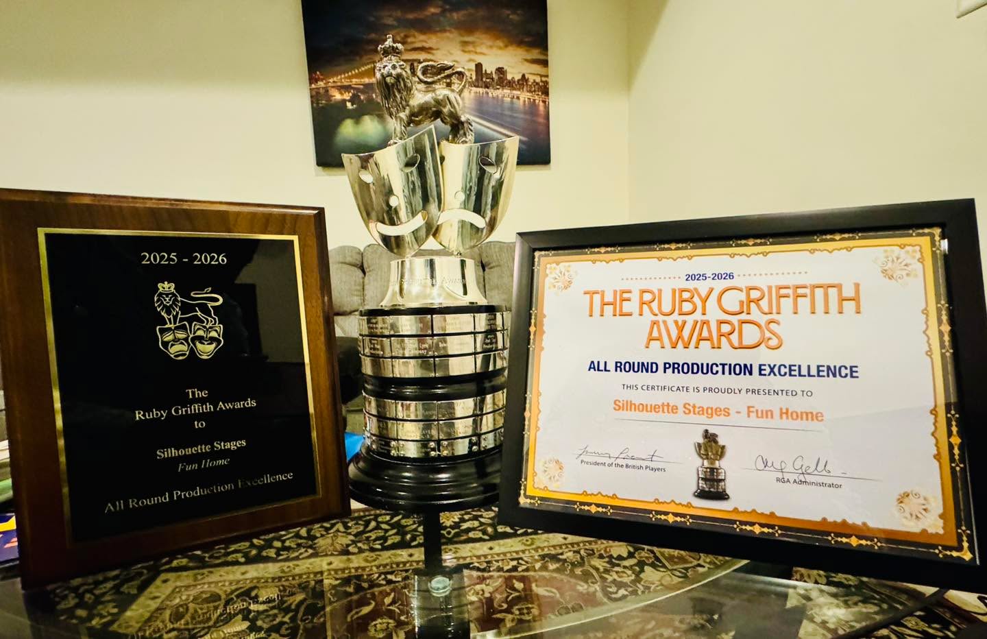 “Fun Home” Wins the Ruby Griffith Award for All-Around Production Excellence! Congratulations to the cast, production team, and crew of our March 2026 production of Fun Home. The British Players present the RGAs annually to regional community theaters, awarding honors for musicals, plays, and a top award for production excellence. We are honored to receive this prestigious award recognizing our artistic achievements for Fun Home and are proud to bring this award back to Howard County.