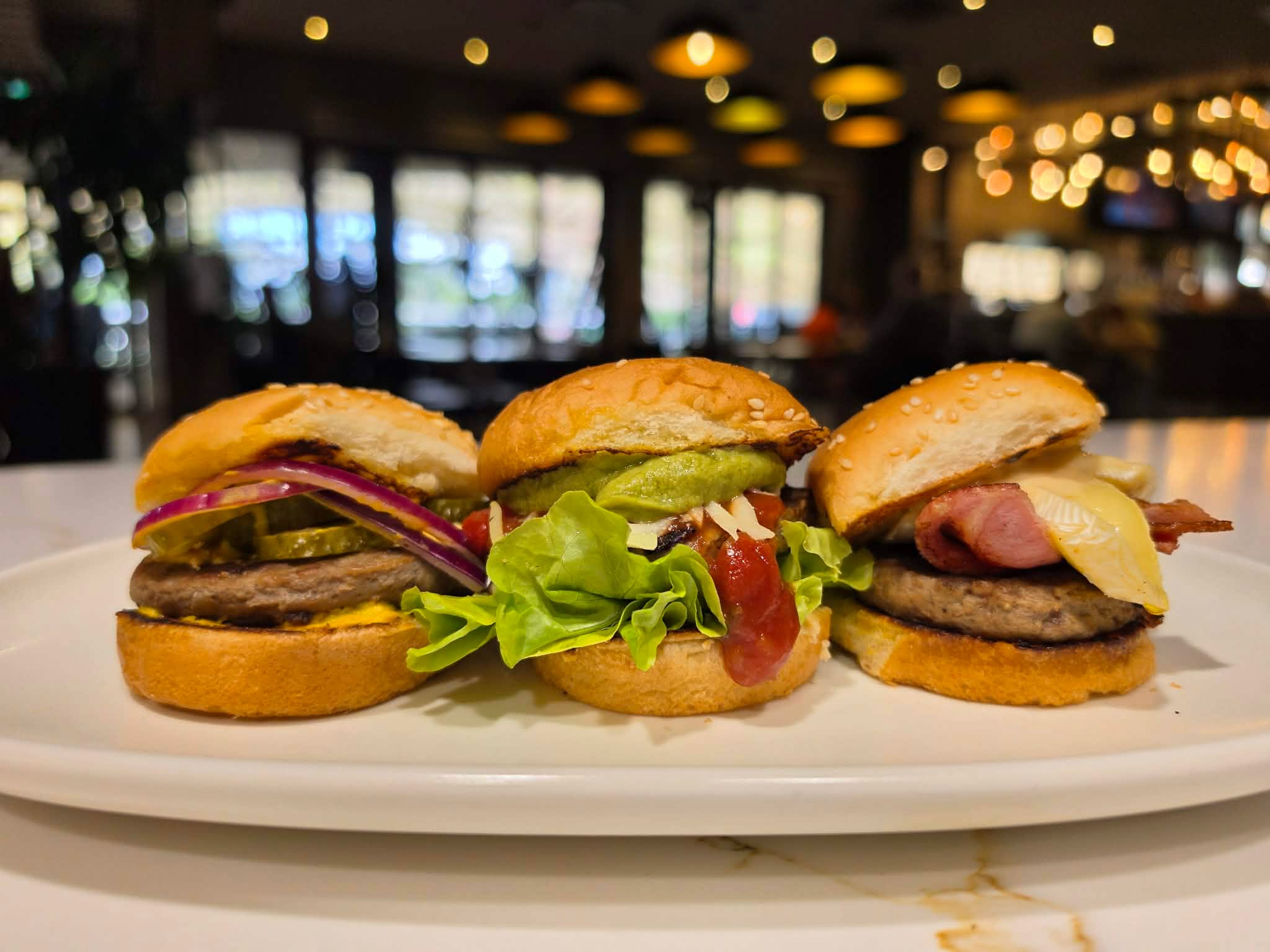 The World Cup kicks off today ⚽🔥
So why not celebrate with one of our specials… have you tried The Host Trio yet? 👀🍔
🇺🇸 Cheeseburger
Beef pattie with American cheese, onions, pickles & mustard
🇲🇽 The Mex
Stacked with avo puree, mozzarella, lettuce & salsa
🇨🇦 Canada Eh
Beef pattie with brie, maple bacon & garlic aioli
Three sliders for just $20 — the ultimate game-day feed. Only in the Hidden Gem and only until 31st July… get amongst it!