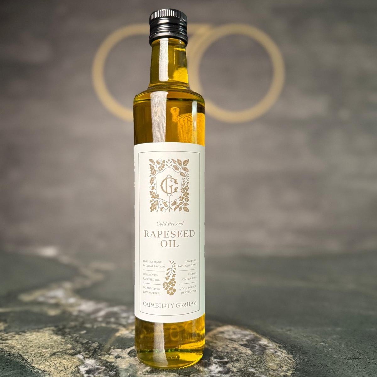 CAPABILITY GRAHAM RAPESEED OIL
This is the best Rapeseed Oil we have tried on the market, and we will tell you what makes it so special. So this is the part of a farming and sustainability project called “Capability Graham” by the Chef-owner of The Ledbury, which is a three Michelin-starred restaurant in England. His name is Brett Graham, and he’s produced this collaboration with a UK farmer called Harry Heath in Shropshire, who works in a circular farming system, as the byproduct is used as animal feed to produce his amazing Iberian Pigs. We will talk about that another time!
This is British-grown rapeseed, farmed and cold-pressed locally. There is no use of glyphosate at harvest, so it has had no chemical input at harvest or during extraction, which is really rare in this day and age. It's got a high smoke point, so this is suitable for frying and roasting, but it's also great for finishing things and making emulsions, for example. Really clean, nutty flavour profile, naturally rich in omega-3 fatty acids because it's cold-pressed. You have to try this!