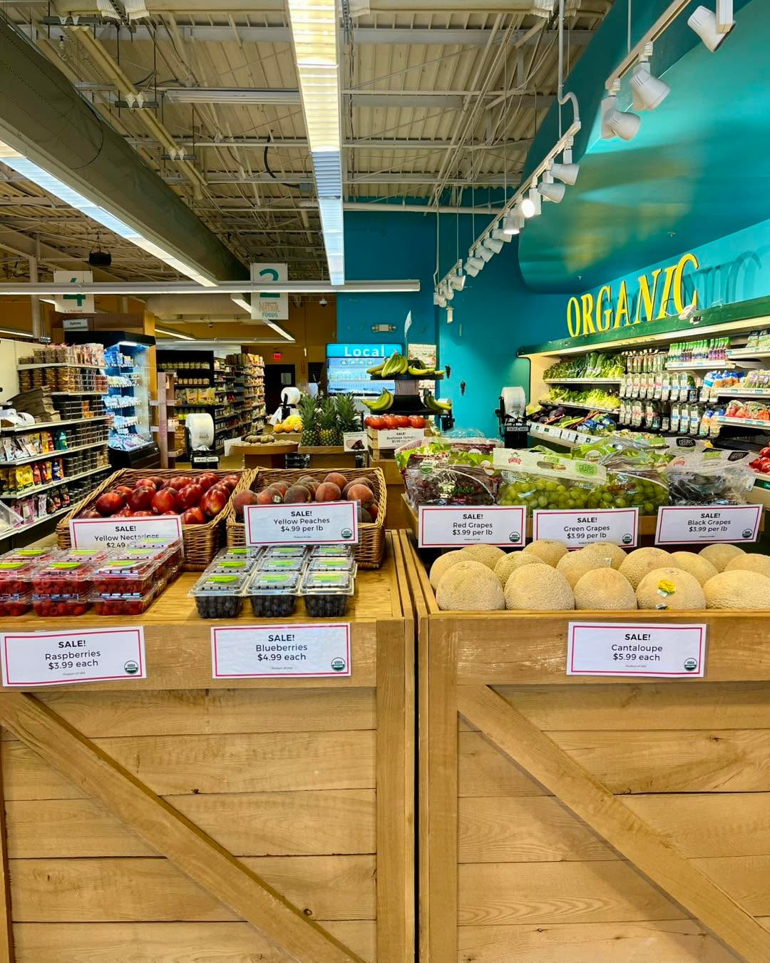 Beat the heat with some fresh, organic fruit on sale now! 🍇
