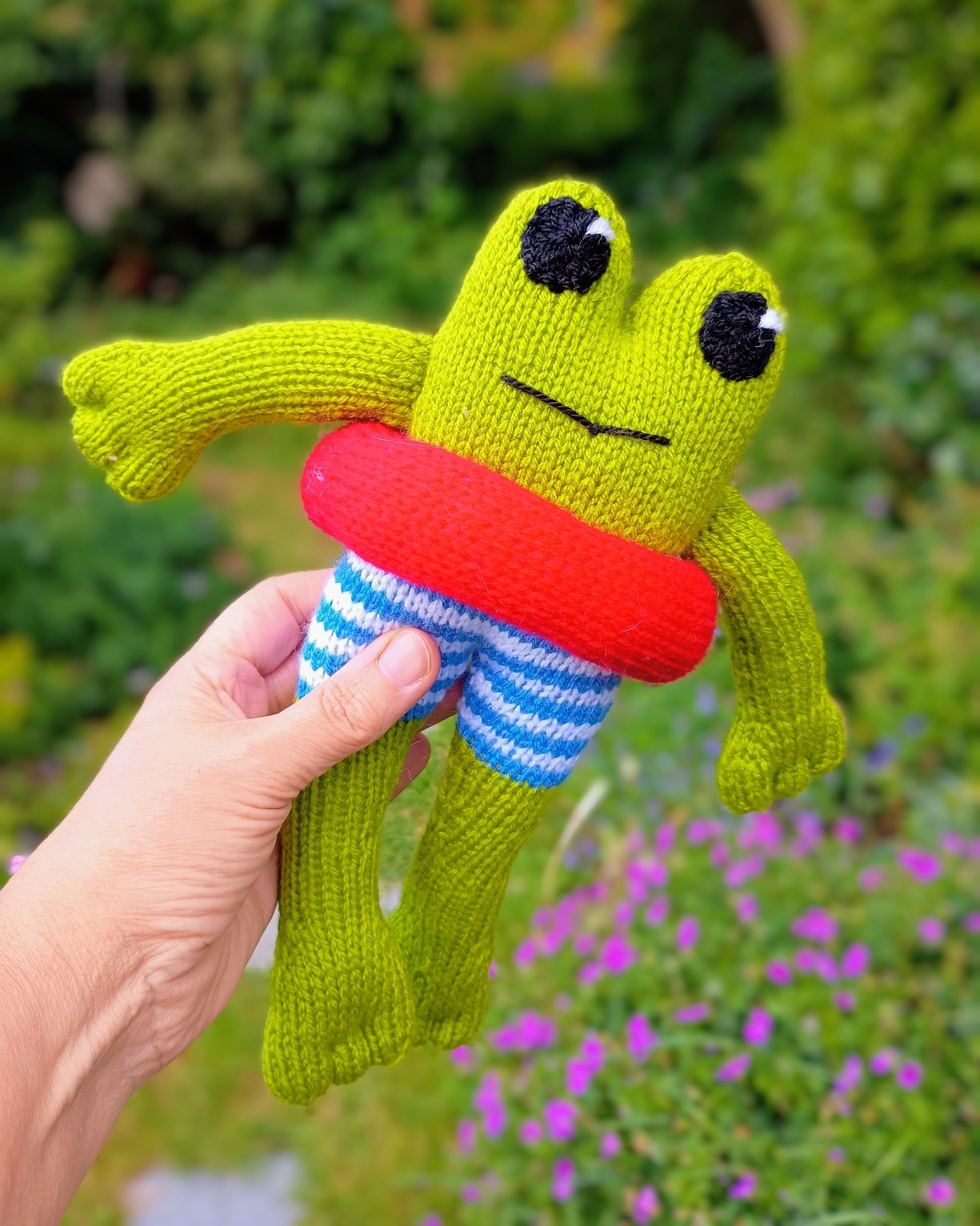 Thank you all for your wonderful guesses—so many creative ideas! I’m excited to finally share the answer: meet the Summer Splash Frog 🐸☀️
I've listed him on Ravelry so far- he'll be on Etsy and Lovecrafts very soon! (just couldn't wait to let you see him!)
https://www.ravelry.com/patterns/library/summer-splash-frog