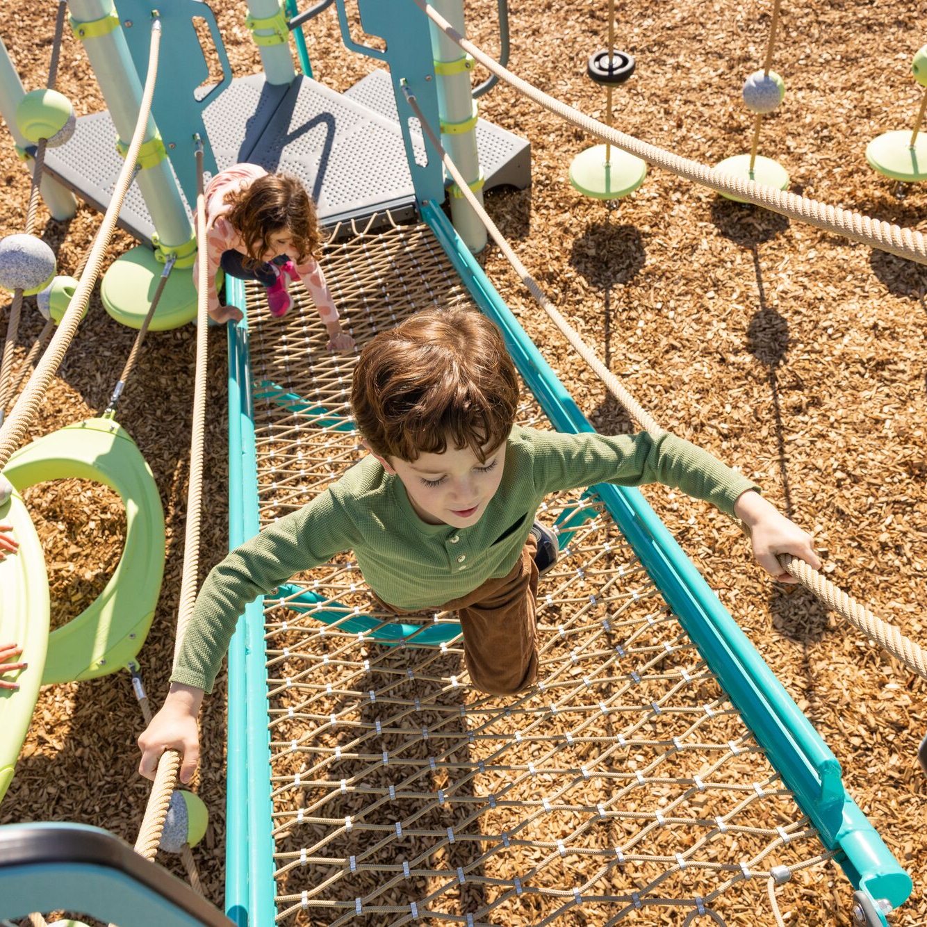 Every kid deserves their own path to adventure. 💚
The FlexxWay™ Climber features revolutionary LSI Flexx® steel-reinforced cable netting, designed for climbing, bouncing, relaxing, and exploring. This innovative component creates an accessible, continuous route between play levels, making it easier for kids of all abilities to reach higher areas of the structure. Whether they're racing to the top or taking their time to discover every step, FlexxWay™ encourages movement, confidence, and inclusive play at every turn.
#play #playground #summer #summer #playgrounddesign #climb @playlsi