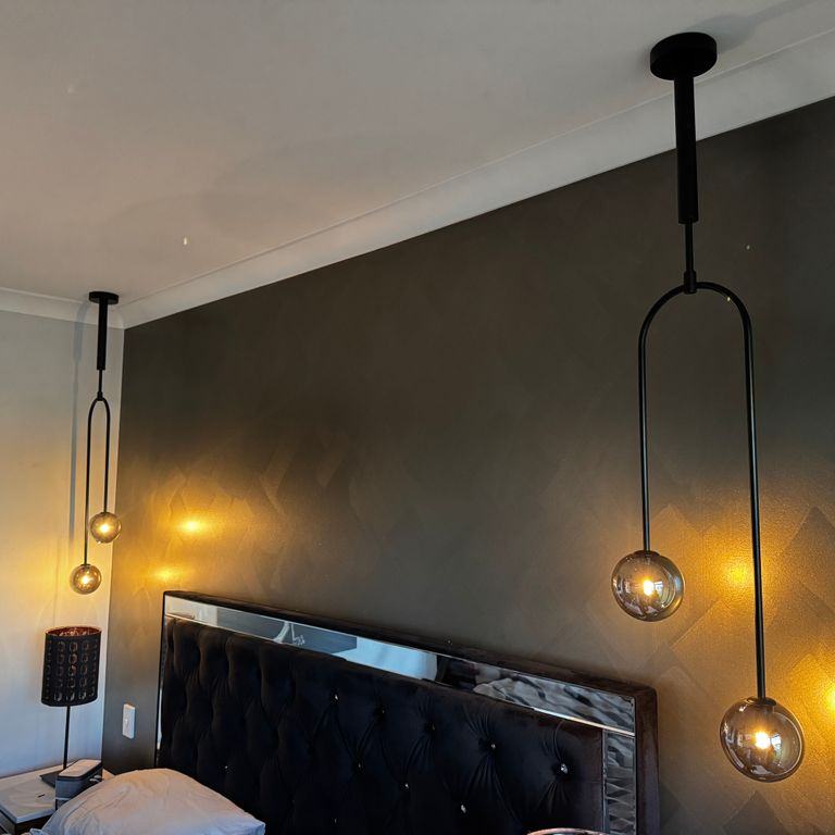 A cosy master bedroom upgrade we recently completed ✨
For this client, we installed 2 x Orion 2 Light Pendants in Black with Smoke Glass on either side of the bed, plus a black Futura 122cm Fan with Light in the centre of the room, lights and fan supplied by Beacon Lighting.
The client wanted to be able to control the pendant lights from either side of the bed, because honestly, who wants to get out of bed to turn the lights off in this weather? 🥶
As this was an internal single brick wall, we installed 2 x wireless kinetic light switches, with the receiver installed in the roof space. This gave the client the convenience of bedside switching without the need for chasing walls.
A simple upgrade, but such a practical and stylish finish for the room.
Get in touch if you’d like a quote for lighting or fan installations.
Check out the products here - https://www.beaconlighting.com.au/futura-122cm-fan-with-light-in-black
https://www.beaconlighting.com.au/orion-2-light-pendant-in-black-with-smoke-glass
#perthelectrician #lighting #bedroomdesign