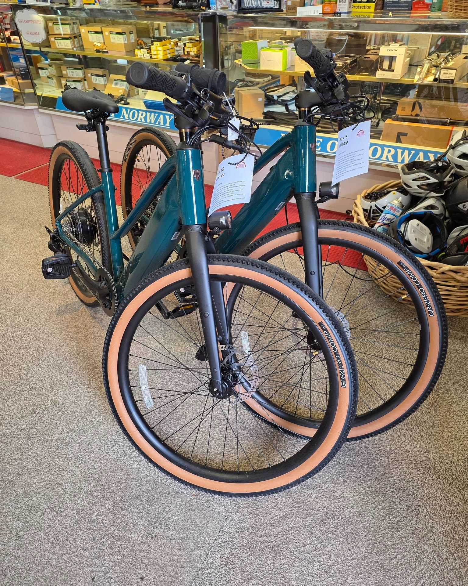 If you've been thinking about going the e-bike route, the FX+ 1s Midstep is a great choice, with a frame that’s easy to hop on and go.
Pedal assist up to 28mph helps you move quicker, and the thumb throttle makes starts and stops feel simple and smooth. Gravel tires add versatility, while integrated turn signals and a brake light help you stand out and feel more confident.
