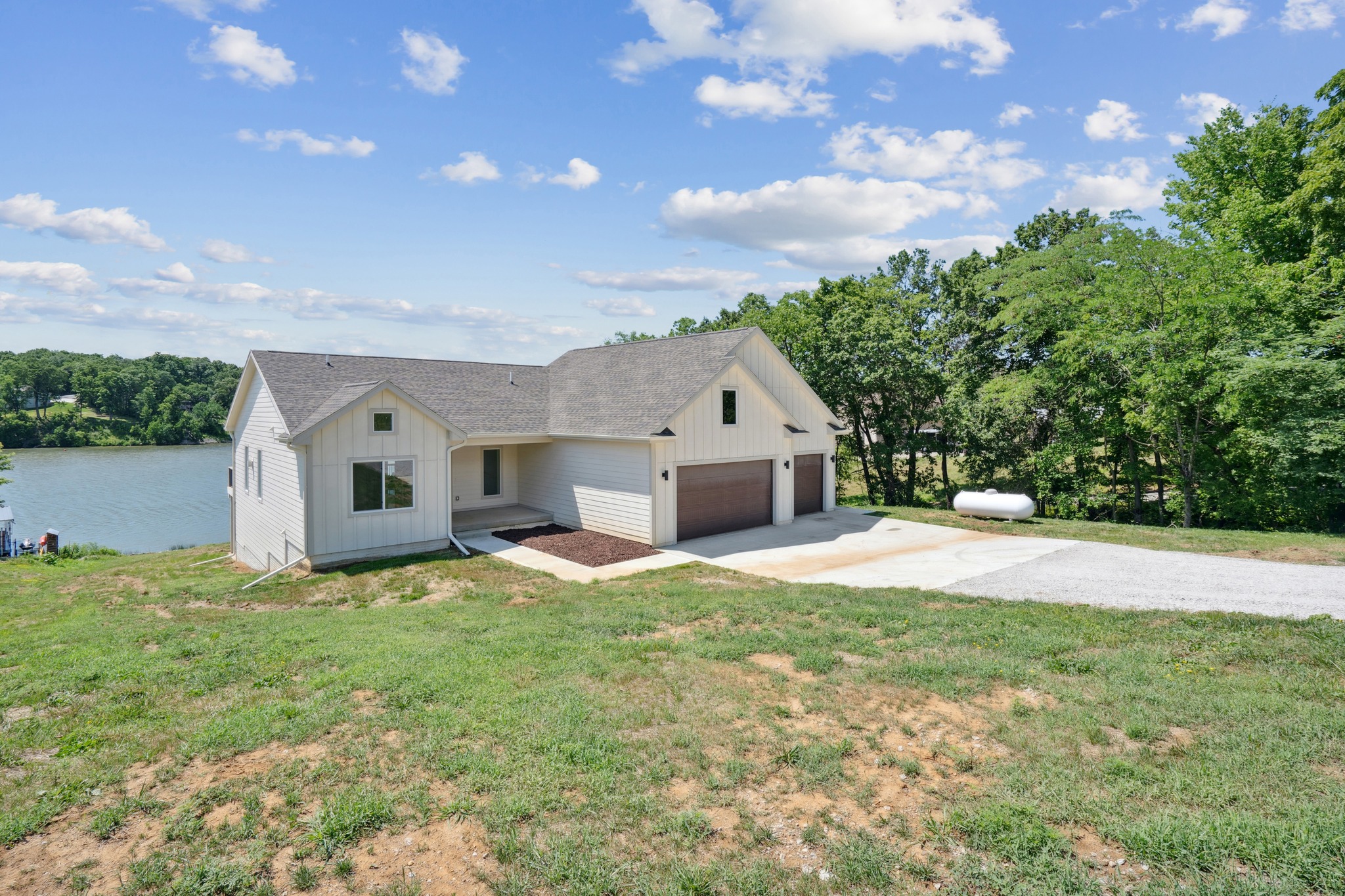 Hard to beat this setup.
A custom walkout ranch by Berkey Homebuilders sitting on the shores of private Sundown Lake. Floor-to-ceiling stone fireplace. Wall of windows. Covered deck. Sandy beach. Plenty of room for family and friends.
The kind of place where summers are spent on the water and memories are made for years to come.
Built right. Built to last.
-
-
-
Berkey Homebuilders Inc.
515-967-3136
admin@berkeyhomebuilders.com
www.berkeyhomebuilders.com
1000 9th NE, Altoona, IA, 50009