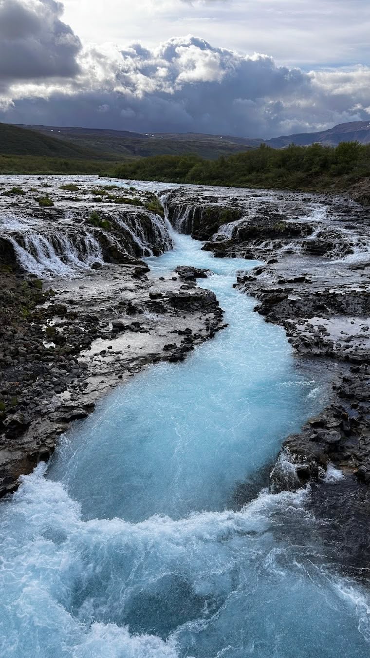 Iceland is always moving.
Water cuts through lava.
Weather moves across the hills.
Light changes the land from one moment to the next.
That is why a private journey here should never feel rushed.
The best days are not only about where you stop.
They are about having the time to notice what is happening around you.
Yours to Explore.
#Thisland #PrivateIceland #IcelandTravel #VisitIceland #TravelIceland #SlowTravel #IcelandWaterfalls #IcelandSummer #NatureTravel #IcelandNature #PrivateTravel