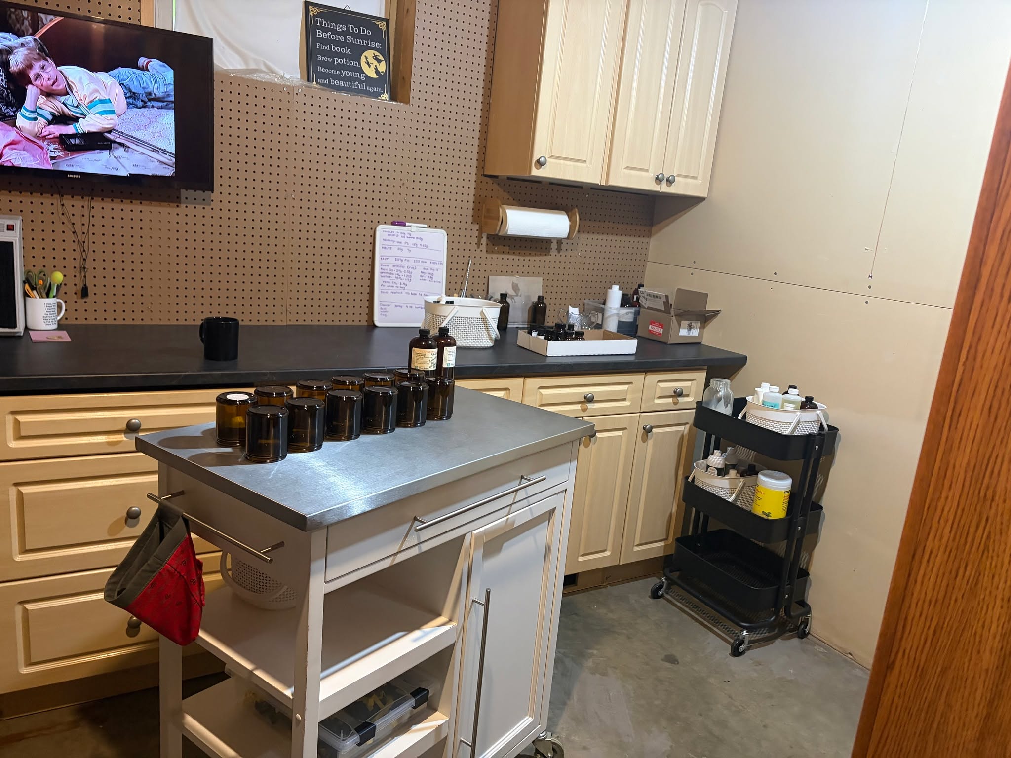 The studio's mid-change right now. New cabinets went in, a kitchen someone else was tearing out, basically new, and I'm genuinely thrilled with them. Lighting goes up in the next day or two, then flooring after that.
I've been calling this place the scent dungeon for a while now. Not sure that name's going to hold much longer.