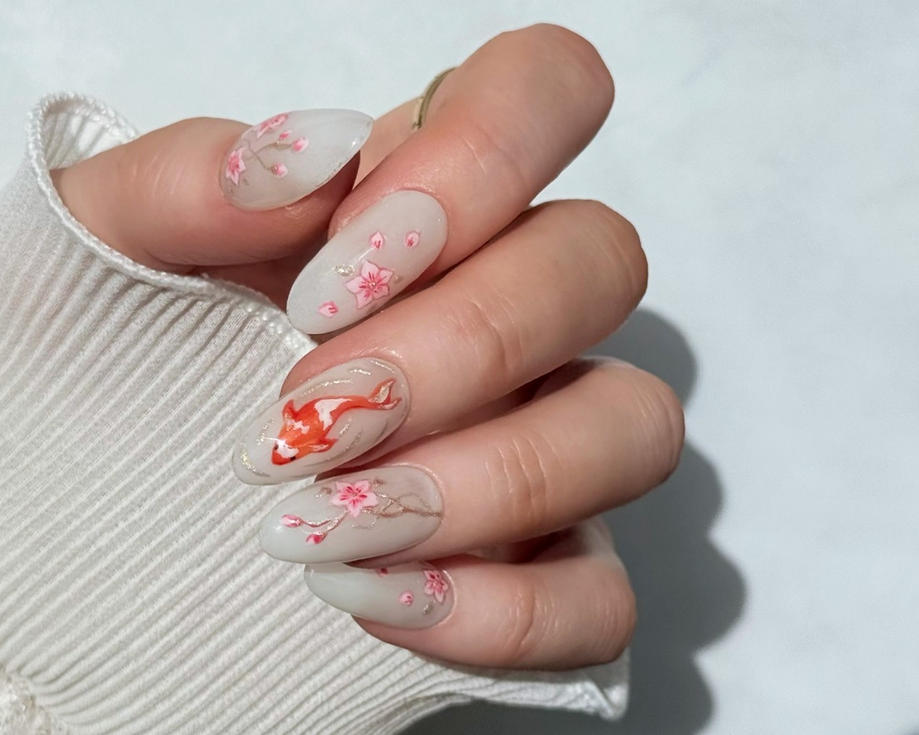 🌸 Inspired by the beauty of blooming sakura and the serenity of koi-filled waters. 🌸
Introducing Golden Lotus by LCN—a stunning new colour collection that brings timeless elegance to every manicure. Featured here is Sakura, a delicate pink shade that perfectly complements intricate blossom and koi-inspired nail art.
Available now in:
✨ Recolution Advanced
✨ Nail Polish
✨ WOW Hybrid Polish
Create looks that capture grace, balance, and beauty with every brushstroke.
#LCNCanada #LCNGoldenLotus #SakuraNails #NailArtInspiration #KoiNails #CherryBlossomNails #RecolutionAdvanced #WOWHybridPolish #ProfessionalNails