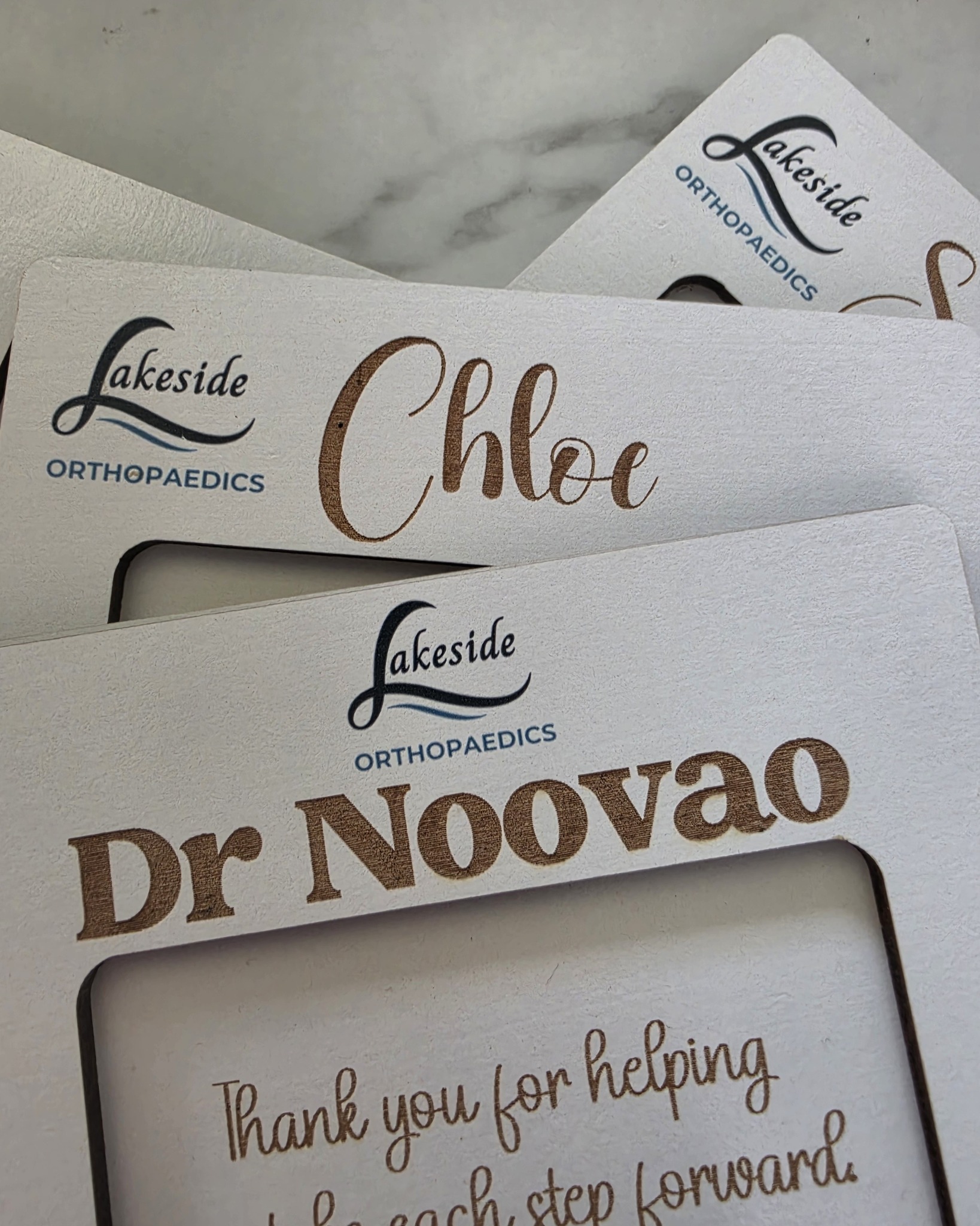Laser cut and engraved + UV printed custom 'Post it Note' holders.