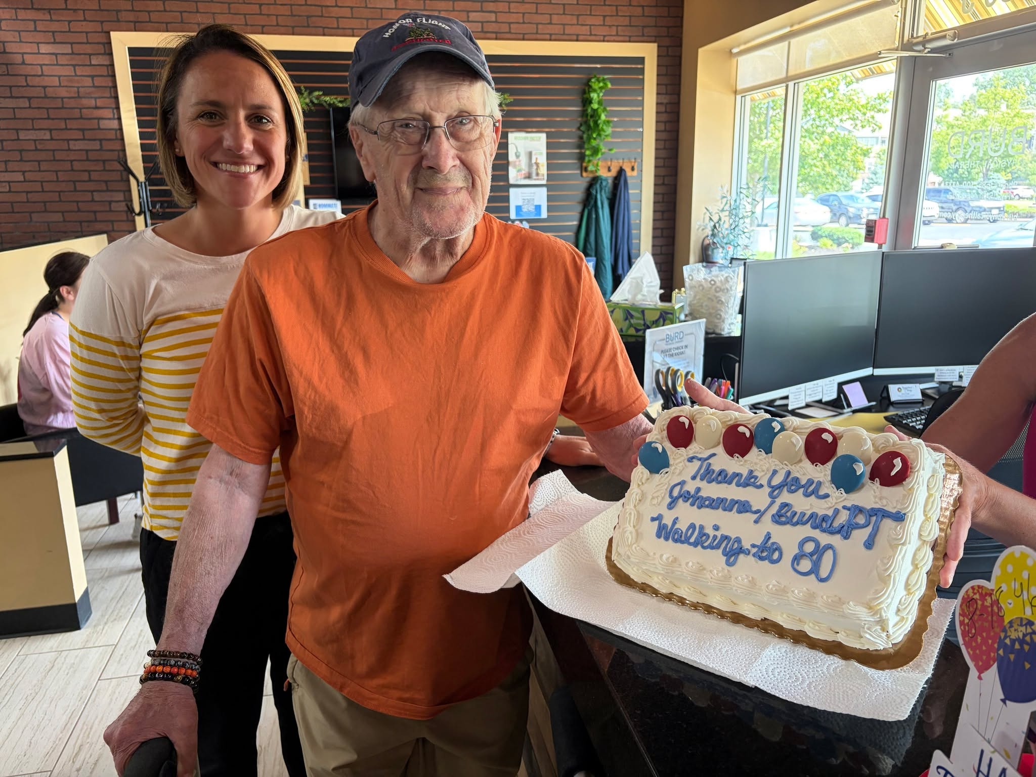 One of our past patients came in to celebrate his upcoming 80th birthday with his PT, Johanna. He wanted to celebrate with Johanna and BURD for making it possible for him to still walk at his 80th birthday.
Bill had multiple co morbidities including both orthopedic and neurological diagnosis. His main goal was to increase balance, increase endurance and strength and safety with using a walker. So, it is extremely special to see and celebrate him reach his goals and beyond.