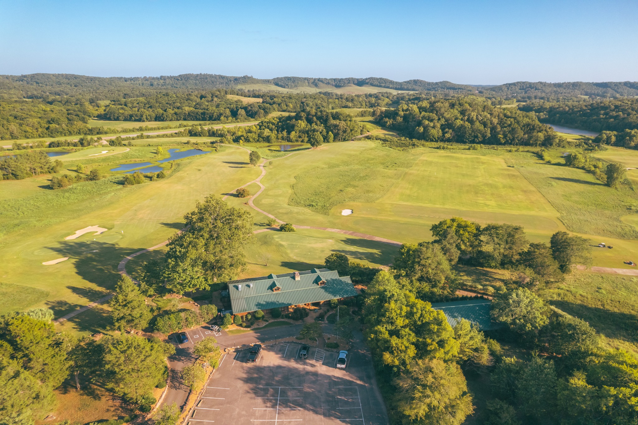 ⛳️ Your next unforgettable round is waiting at Ross Creek Landing.
Ross Creek Landing offers a one-of-a-kind golf experience along the scenic Tennessee River. Nestled in the rolling hills of Clifton, Tennessee, this stunning course combines breathtaking views with a layout that's both challenging and rewarding for golfers of all skill levels.
Now open and ready for play—come experience the beauty, the challenge, and the unforgettable memories that await on every hole. Book your tee time today! 🏌️♂️🌅
📍 Clifton, TN
📸 Design Sensory