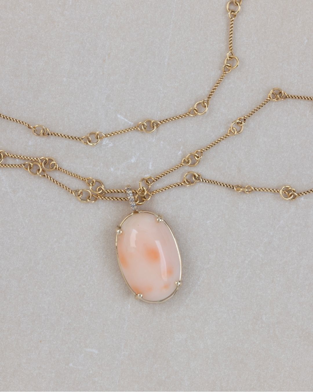 One-of-a-kind coral pendant on our gold 14k handcrafted twisted line chain. #fotinipsarouli #fotinipsaroulijewellery #finejewelry #handmadejewelry #Pendant