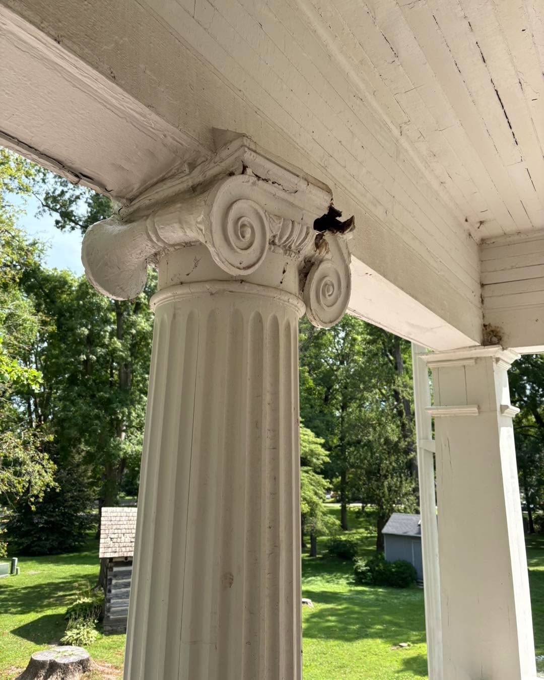 Have you walked by Lane Place this summer?
If so, you might have noticed the bright orange temporary fencing around the north side of the home. Taking a closer look you would see the sad state of our north porch and columns. Due to a leak in the porch roof, water infiltration has caused havoc. A bad situation transformed into a critical situation thanks to a mix of extreme freezes, difficulty in finding a contractor, and sorting out the finances to fix the problem.
Replacing our north porch header beams and columns is a critical need, and is the next step in safeguarding historic Lane Place. In late 2023, it was first noticed that due to issues with the roof, water had penetrated the edge of the porch roof down into the structure. Since spring of 2024, the column capitals and bases have rapidly deteriorated, most likely due to extremely low temperatures experienced over the past two winters. In 2024, a MCCF Grant allowed us to replace the flat roof above the porch. Ideally, we would have then had the column work done in 2025. However, it took longer than anticipated to find contractors capable of completing the column work, and we were unable to apply for any grants last year. This year we were awarded an MCCF Grant of $70,000 for this project. We are still hoping to raise another $30-40,000 towards this project and next year’s renovation work. Donations can be made online at www.lane-MCHS.org or can be mailed in to the MCHS.
We will replace the columns and header beams this fall, stopping further damage. Continuing in our mission to safeguard historic Lane Place, our next major project will be to replace the building’s copper roof and gutter system. Preventing water infiltration and protecting our county’s history is our top priority.