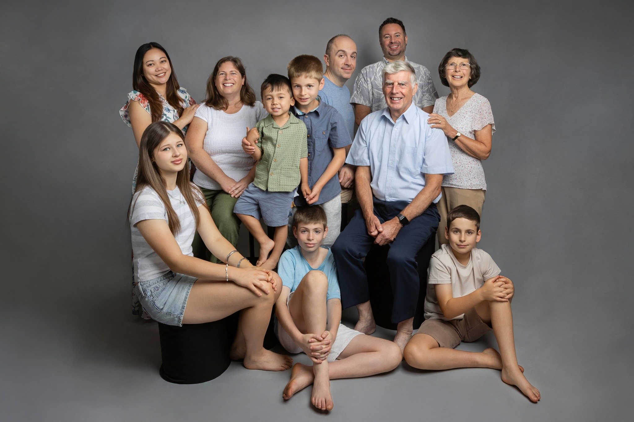 Two 75th birthdays. One studio. A large family to squeeze in and 150 on the balloons.
Apparently the answer to “How many people can we fit in the studio?” is this many.
We photographed the whole family together, the grandchildren with their grandparents and plenty of smaller groups in between. It was busy, slightly chaotic and completely worth it.
Getting everyone in the same place is no small achievement, but photographs like these only become more valuable as the years pass.
A very happy joint 75th birthday to this lovely pair. That’s 150 years between them and a whole family they’ve created together 🤍