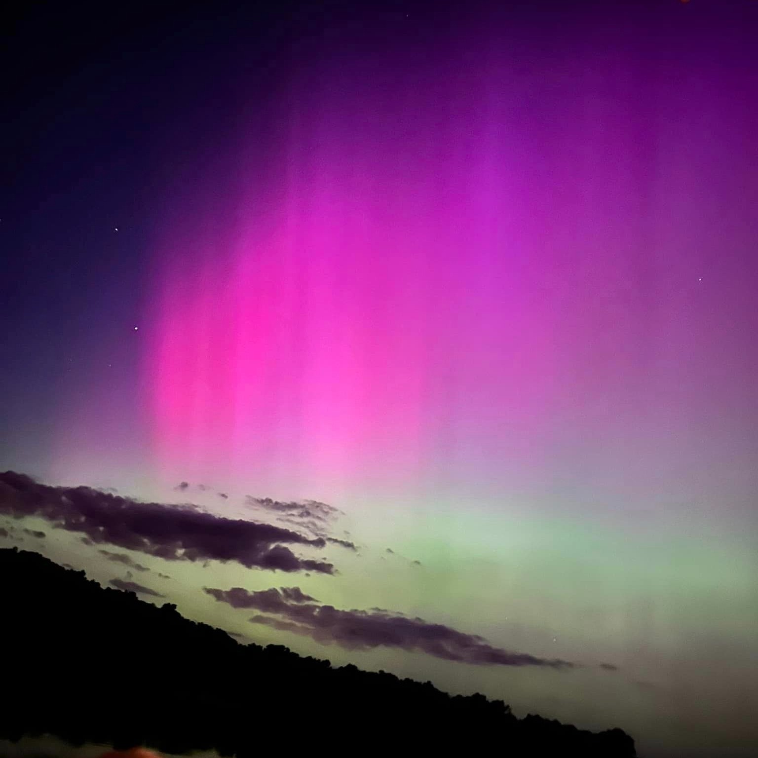 Yes, this is Clifton, Tennessee. Not Iceland. π
Back in May 2024, a rare solar storm sent the northern lights all the way down here β and for one night, the sky over the cove turned pink and purple. Photo credit to one of our neighbors, who caught this moment before we could. Still can't get over it. β€οΈπ€π
Hashtags: #AuroraBorealis #NorthernLights #Tennessee #FullTimeRVLife #CliftonTN #RVLiving